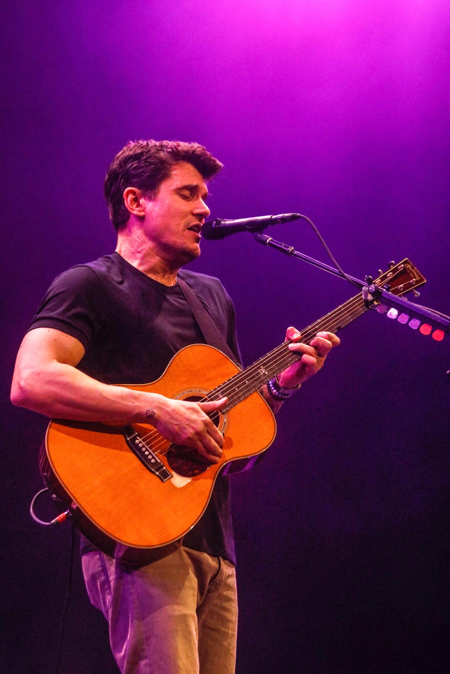 John Mayer performing during his acoustic tour