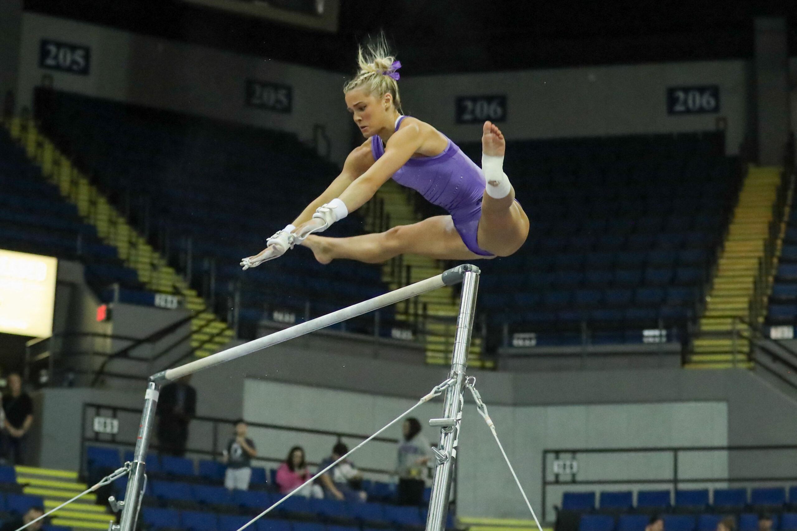 March 3, 2023: LSU's Olivia Dunne performs on the uneven parallel bars during the Purple & Gold Podium Challenge collegiate woman's gymnastics meet at the Raising Canes River Center in Baton Rouge, LA. Jonathan Mailhes/CSM(Credit Image: © Jonathan Mailhes/Cal Sport Media) Newscom/(Mega Agency TagID: csmphotothree059475.jpg) [Photo via Mega Agency]