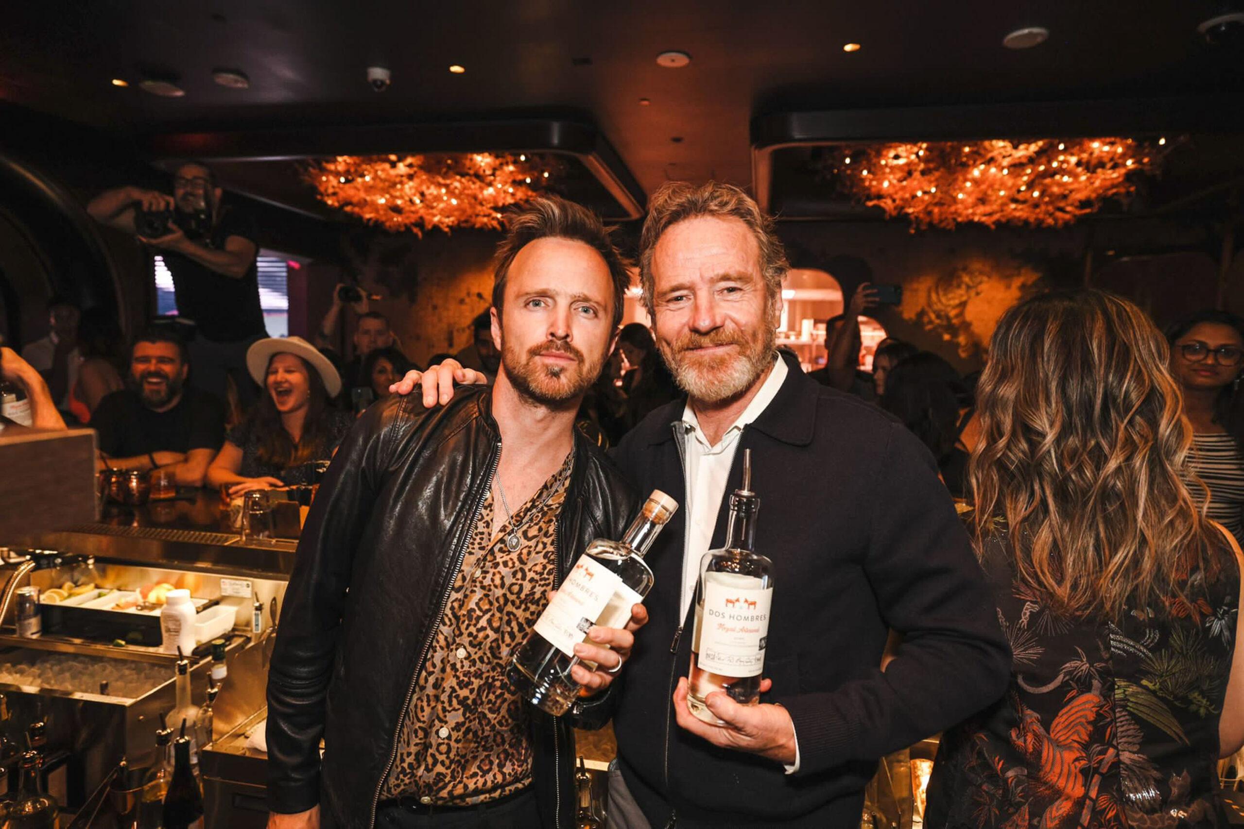 Breaking Bad duo Aaron Paul and Bryan Cranston mix cocktails with their Dos Hombres Mezcal at Resorts World Las Vegas