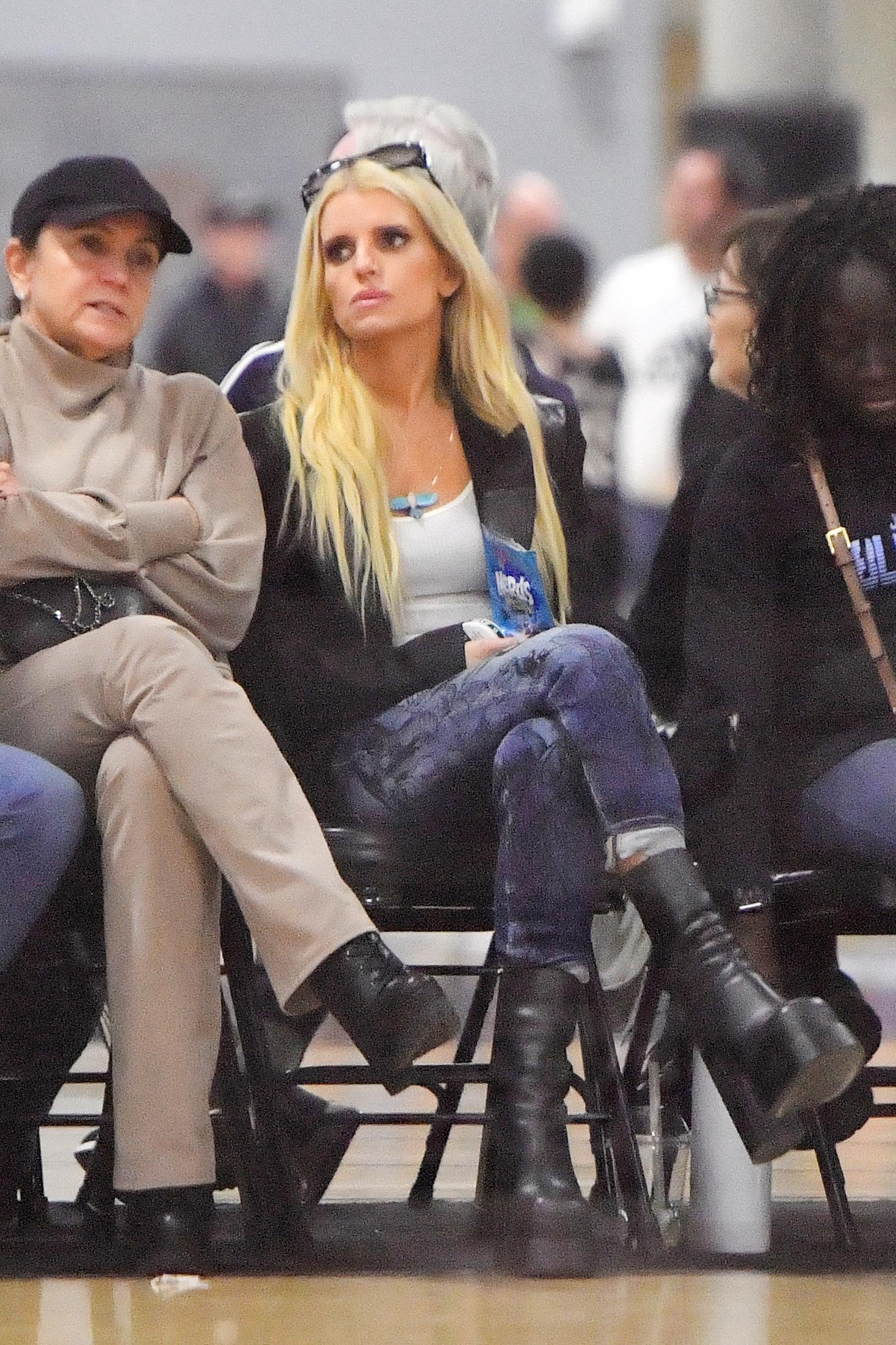 Jessica Simpson apos s weight loss is very apparent as she cheers for her daughter at her basketball game in Calabasas