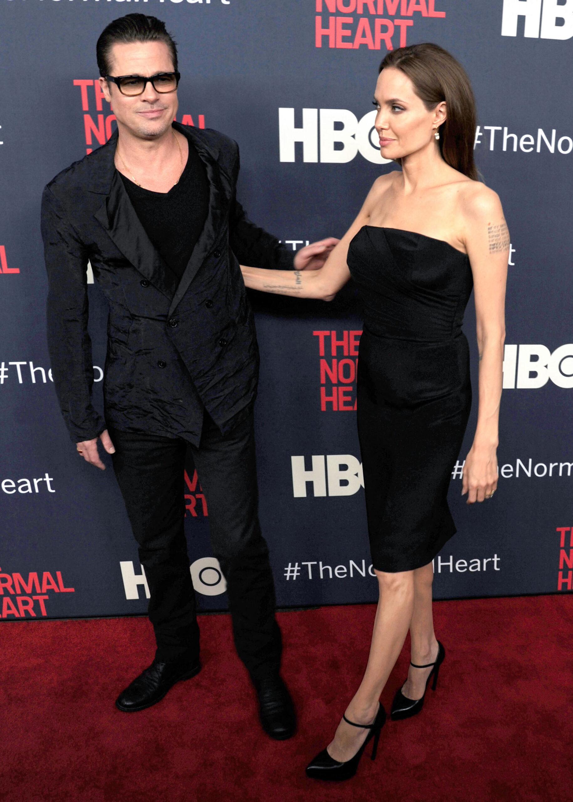 Brad Pitt, Angelina Jolie at an event