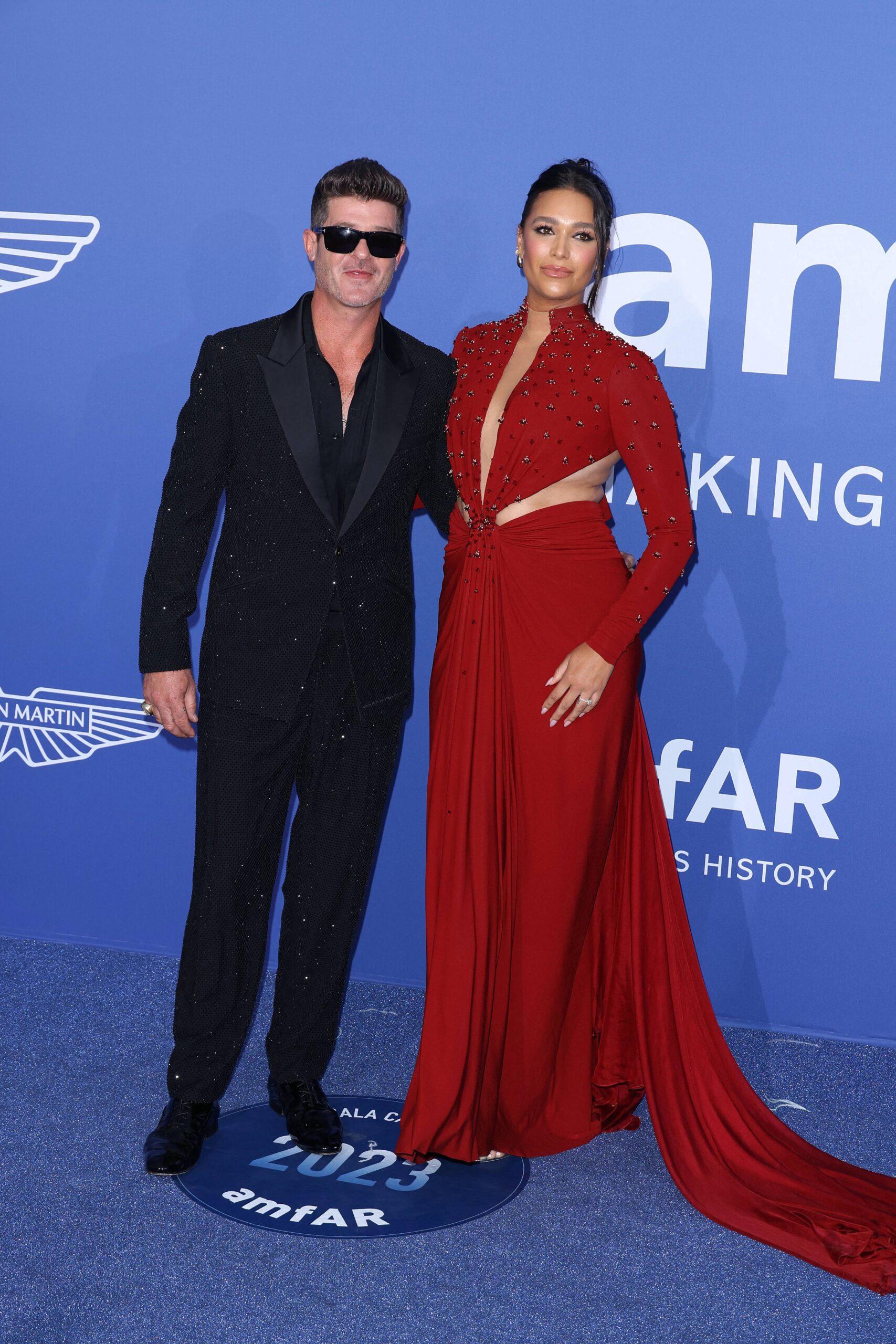 April Love Geary and Robin Thicke at The amfAR Cannes Gala 2023 at Hotel du Cap-Eden-Roc