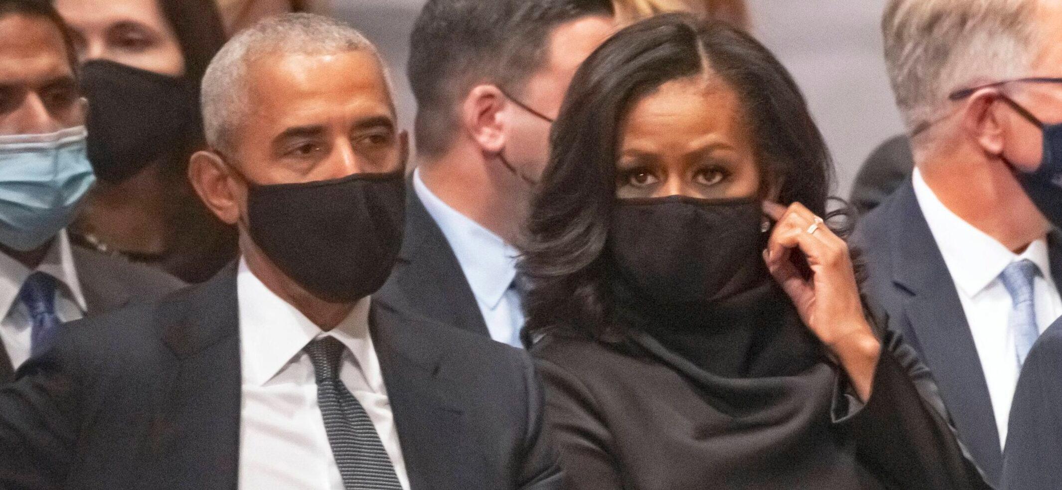 former US President Barack Obama and former first lady Michelle Obama attend the funeral of former US Secretary of State Colin L. Powell at the Washington National Cathedral in Washington, DC