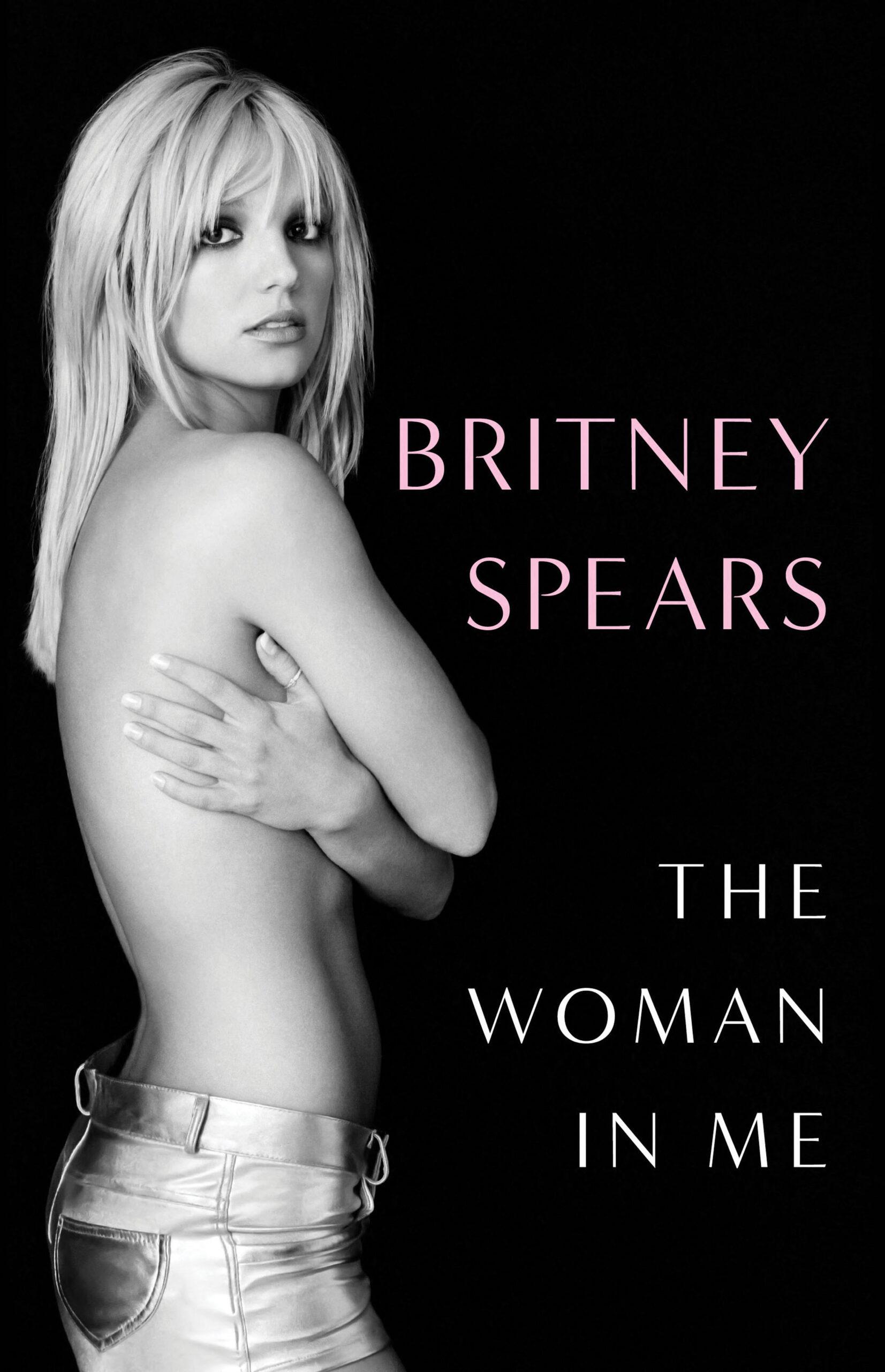 Britney Spears poses topless on the cover of her newly announced memoir The Woman in Me