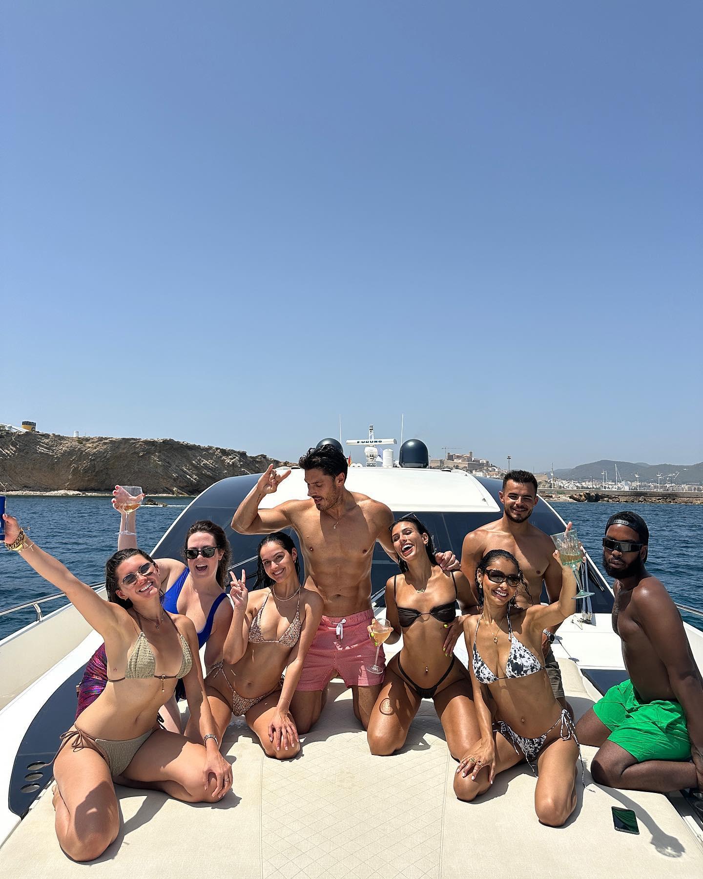 Emily Faye Miller In Bikini Gets Soaked On A Boat In Ibiza