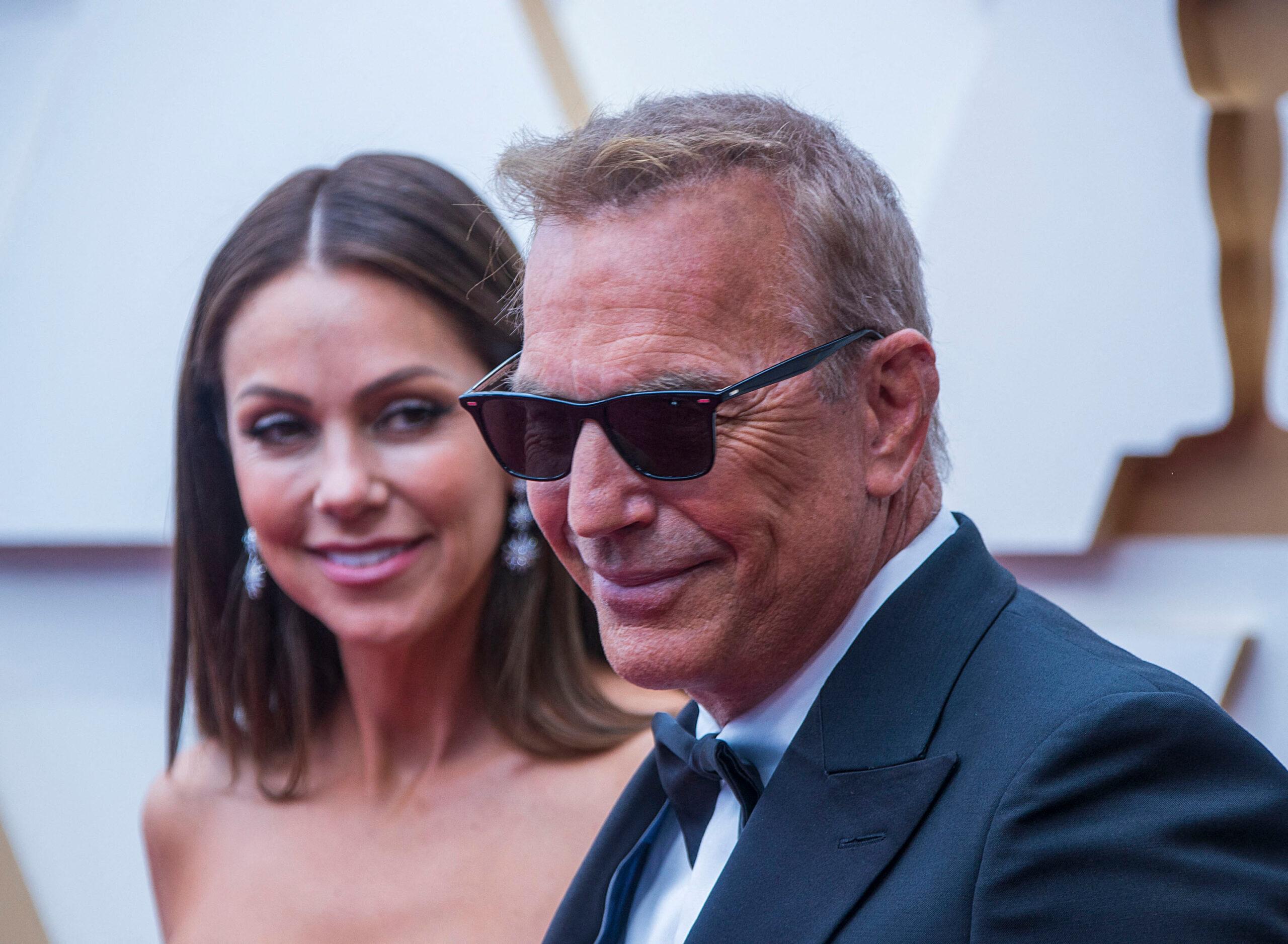 Christine Baumgartner and Kevin Costner at the 28th Annual Screen Actors Guild Awards held on Sunday February 27, 2022 at The Barker Hangar in Santa Monica, California. 24 Jun 2023 Pictured: June 24, 2023, Los Angeles, California, USA: Kevin Costner divorces Christine Baumgartner. FILE PHOTO: Christine Baumgartner and Kevin Costner at the Red Carpet of the 94th Annual Academy Awards