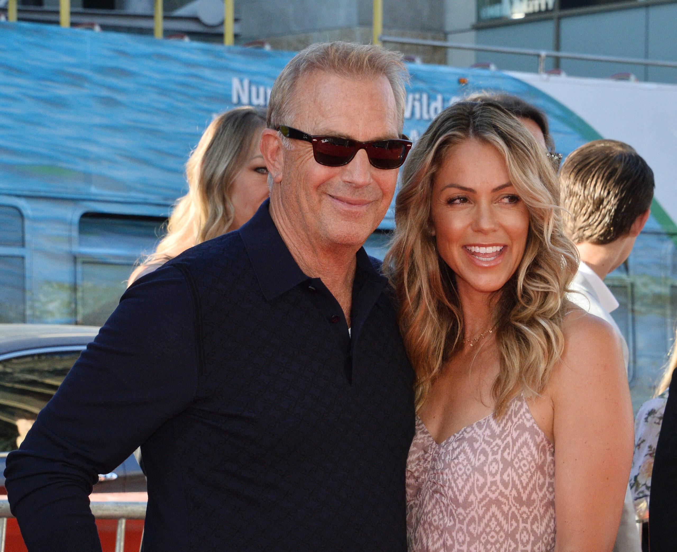 Kevin Costner and Christine Baumgartner