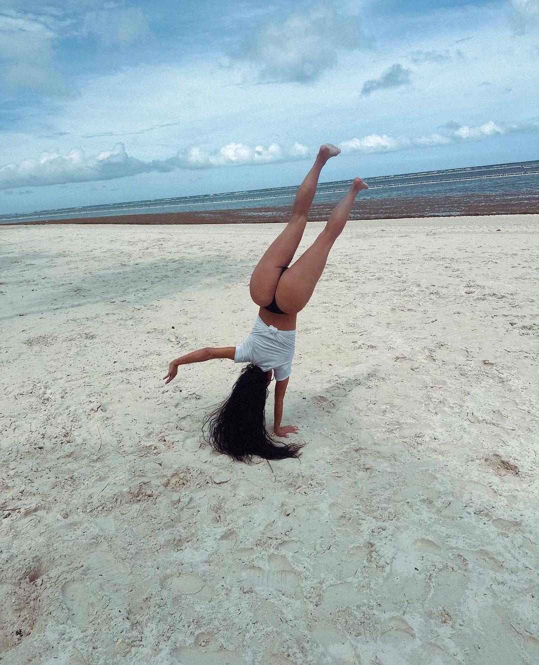 Billionaire Kim Kardashian Does A Cartwheel In A Thong On The Beach 