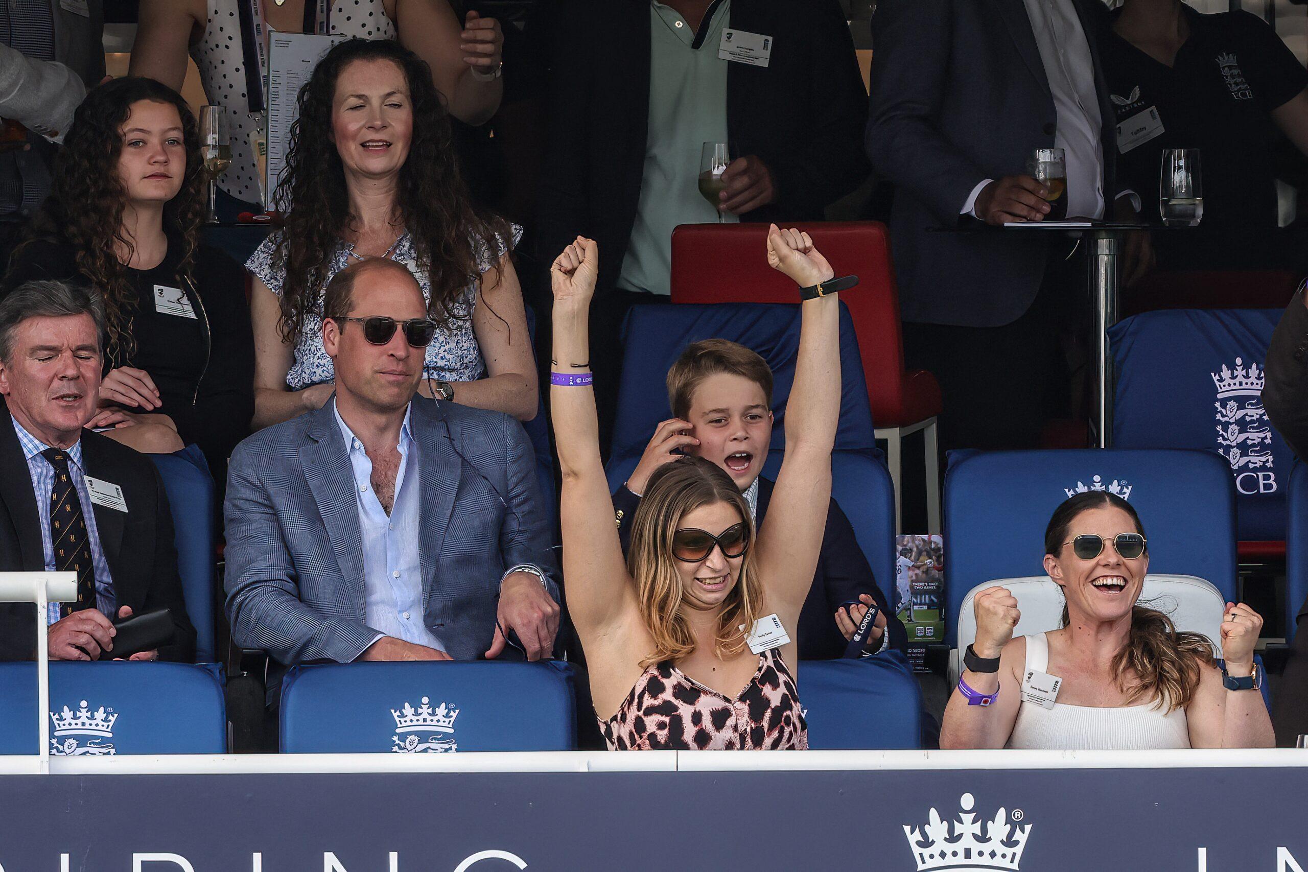 Prince William, Prince of Wales and Prince George of Wales celebrate the wicket of Pat Cummings of Australia during the LV= Insurance Ashes Test Series Second Test Day 4 England v Australia at Lords, London, United Kingdom,