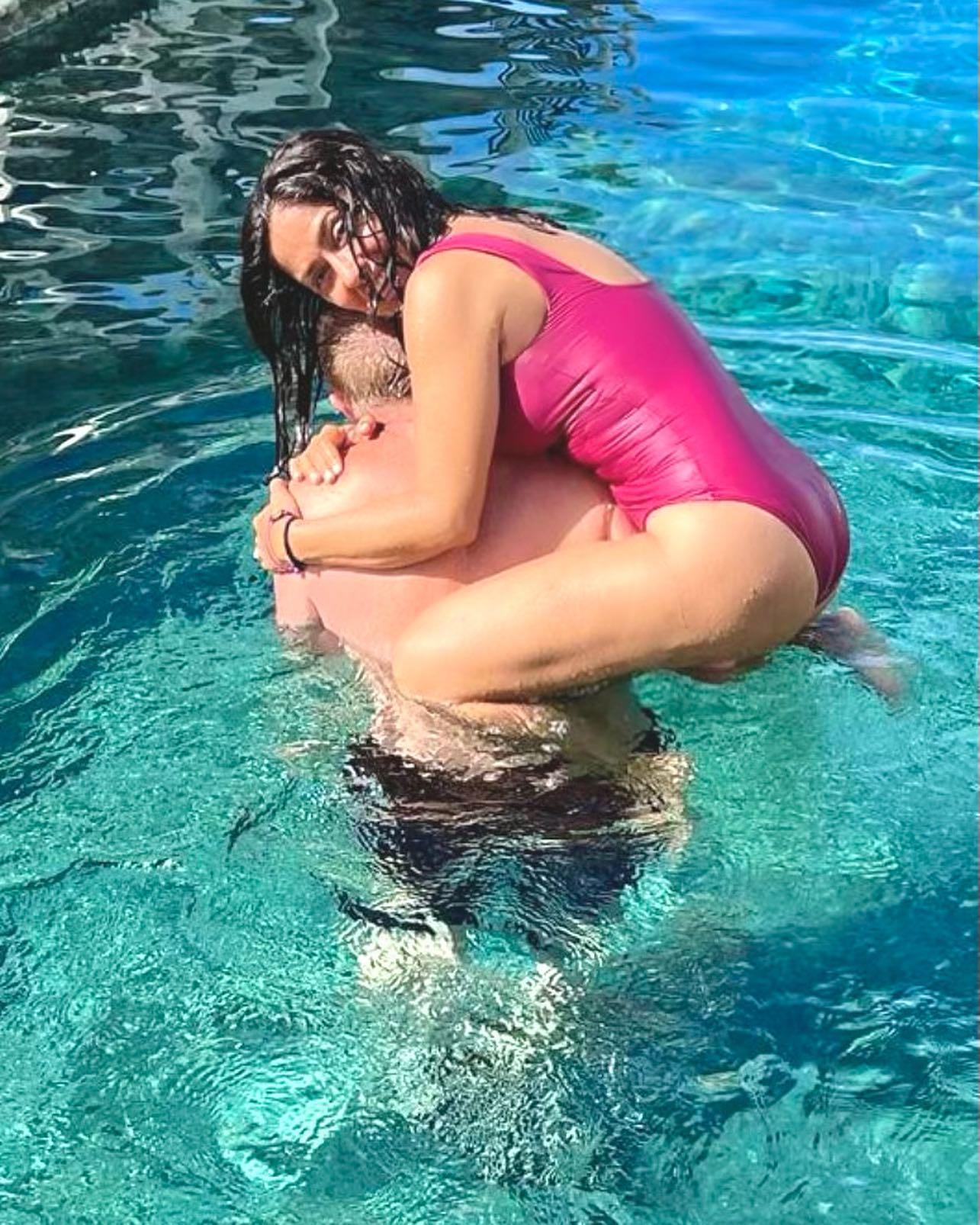 Salma Hayek in a pink swimsuit