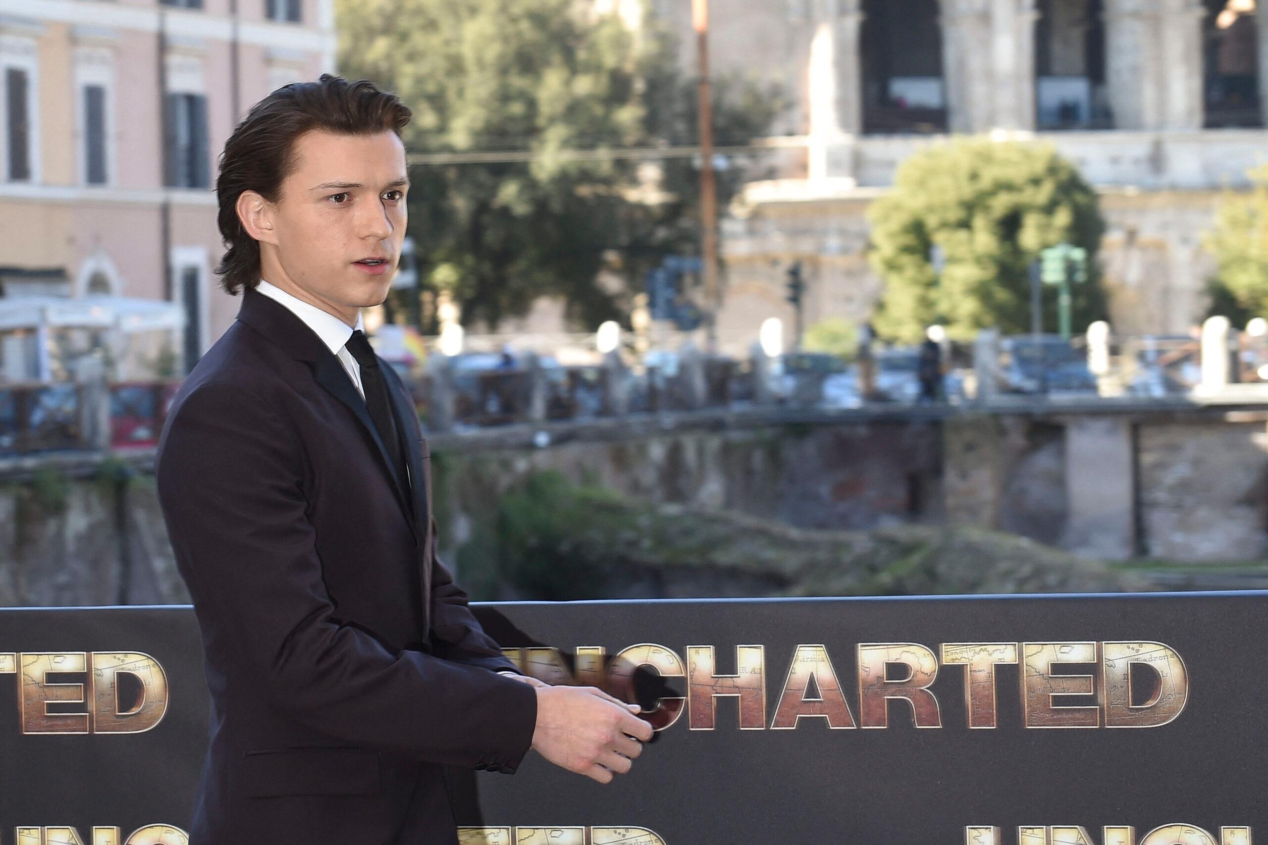 Tom Holland videocalls his mother while attending the photocall of "Uncharted" in Rome.