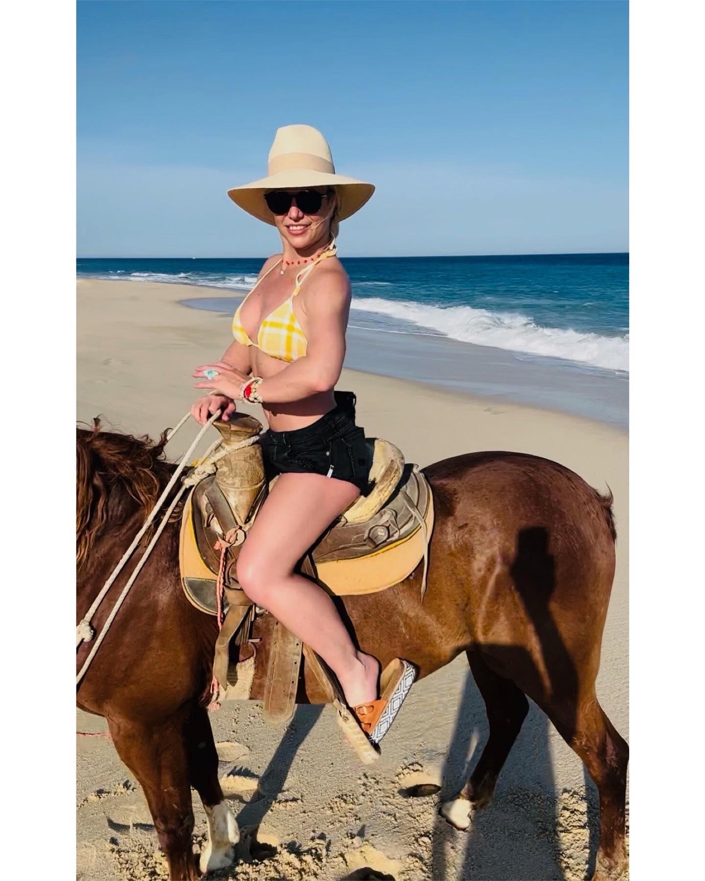 Britney Spears rides a horse
