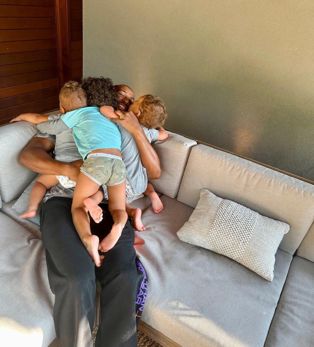 Justin Ervin with his three boys he shares with Ashley Graham