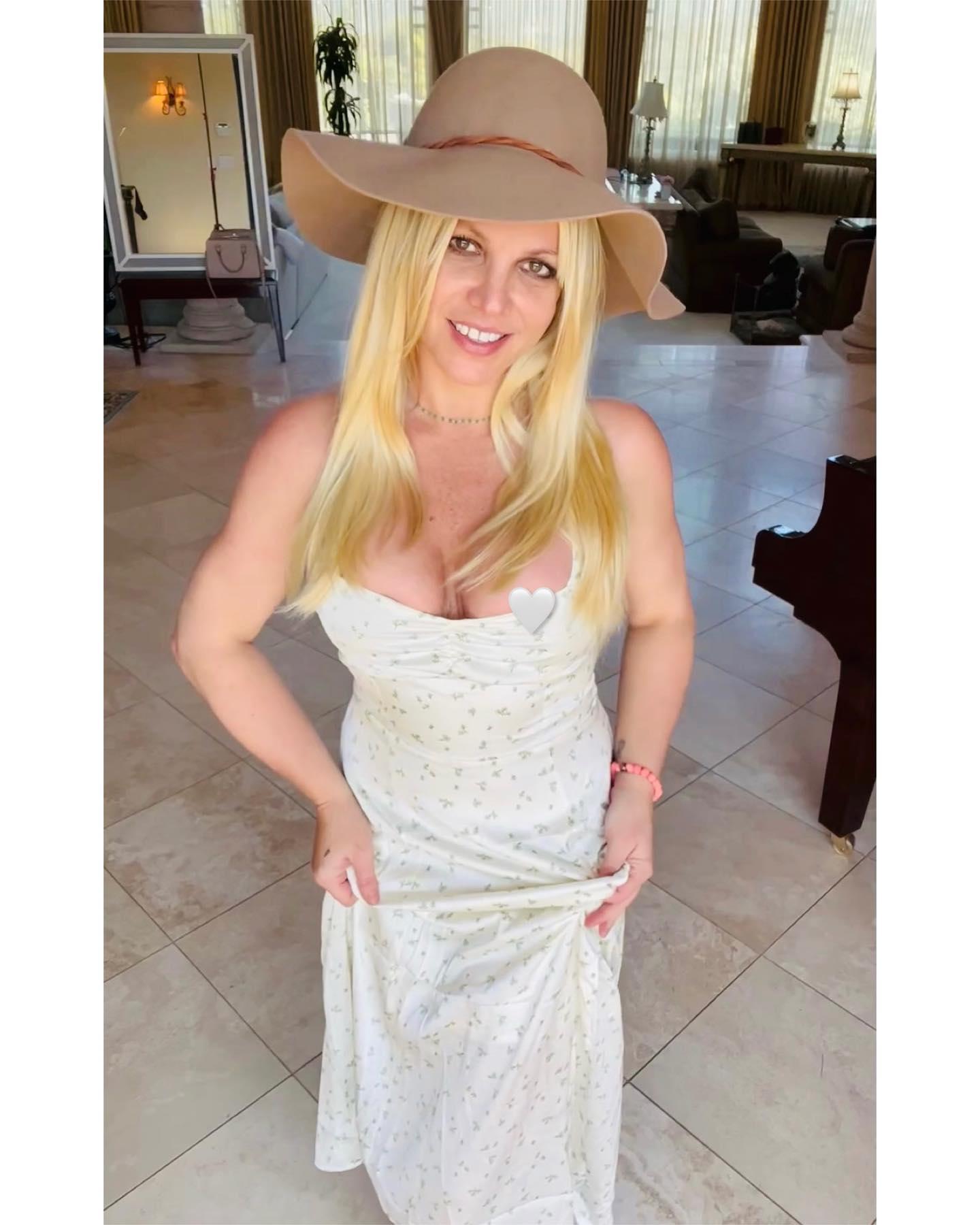 Britney Spears Suffers A Nip Slip In White Floral Dress