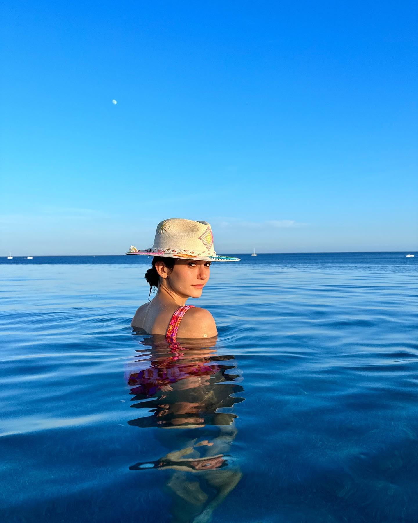 Nina Dobrev In 'Barbie' Pink Swimsuit Goes For A Swim In Cabo