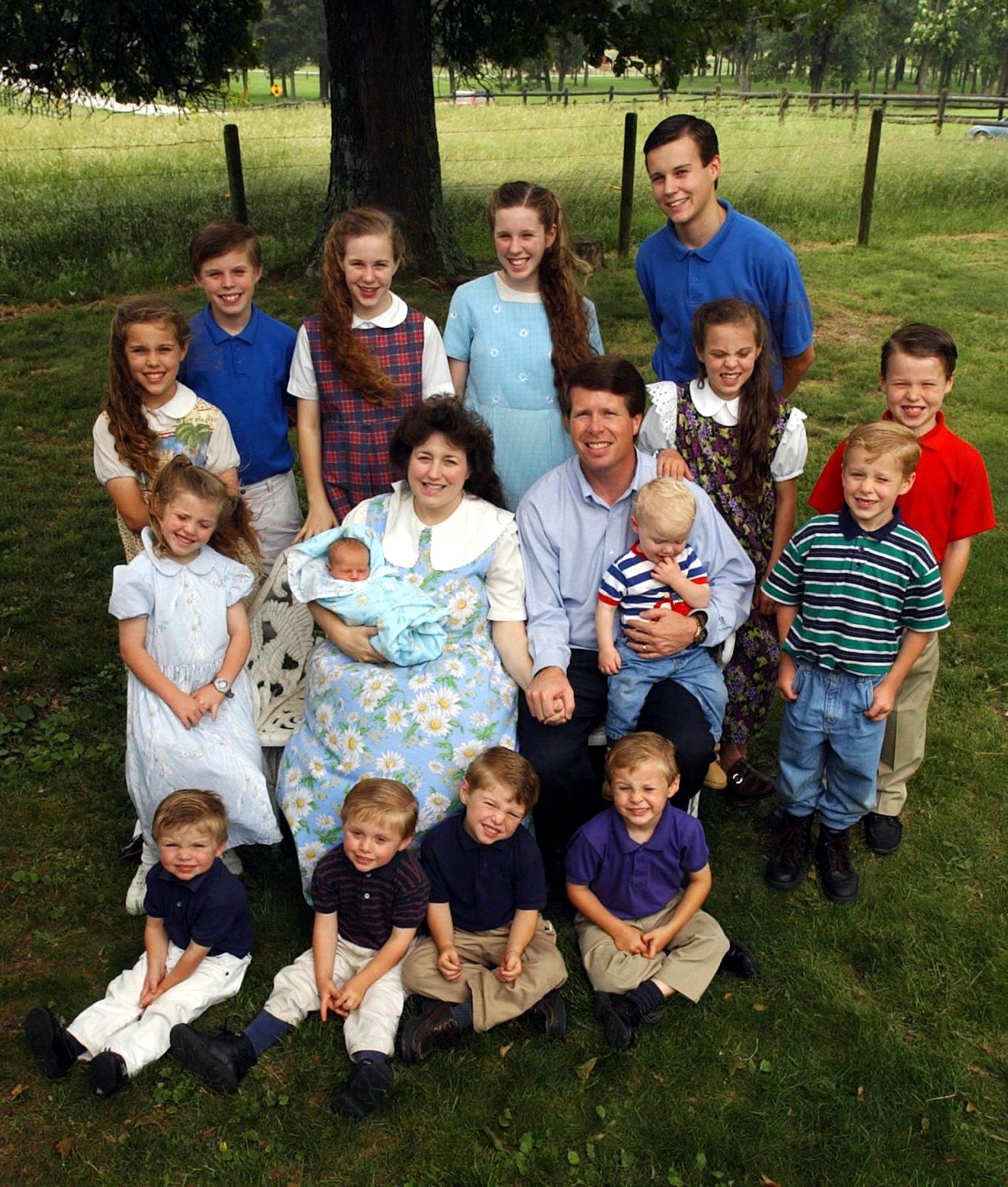 Michelle Duggar, 37, holds her 15th child, Jackson, who was born May 23, 2004 in a family photo.