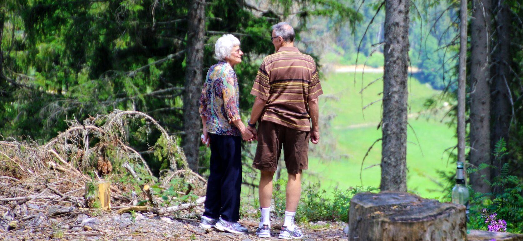 Portrait of an older couple in a park