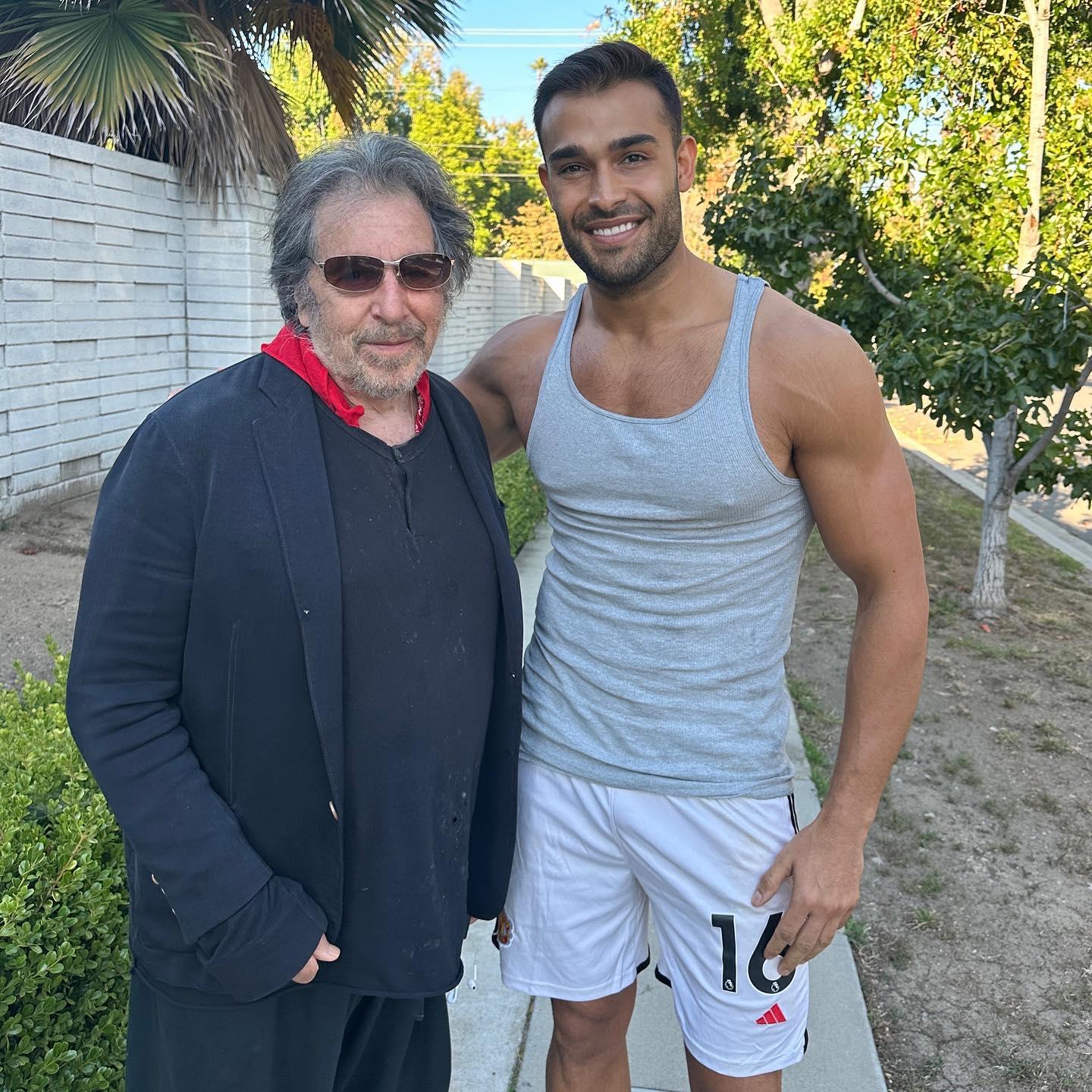 Sam Asghari poses with Al Pacino