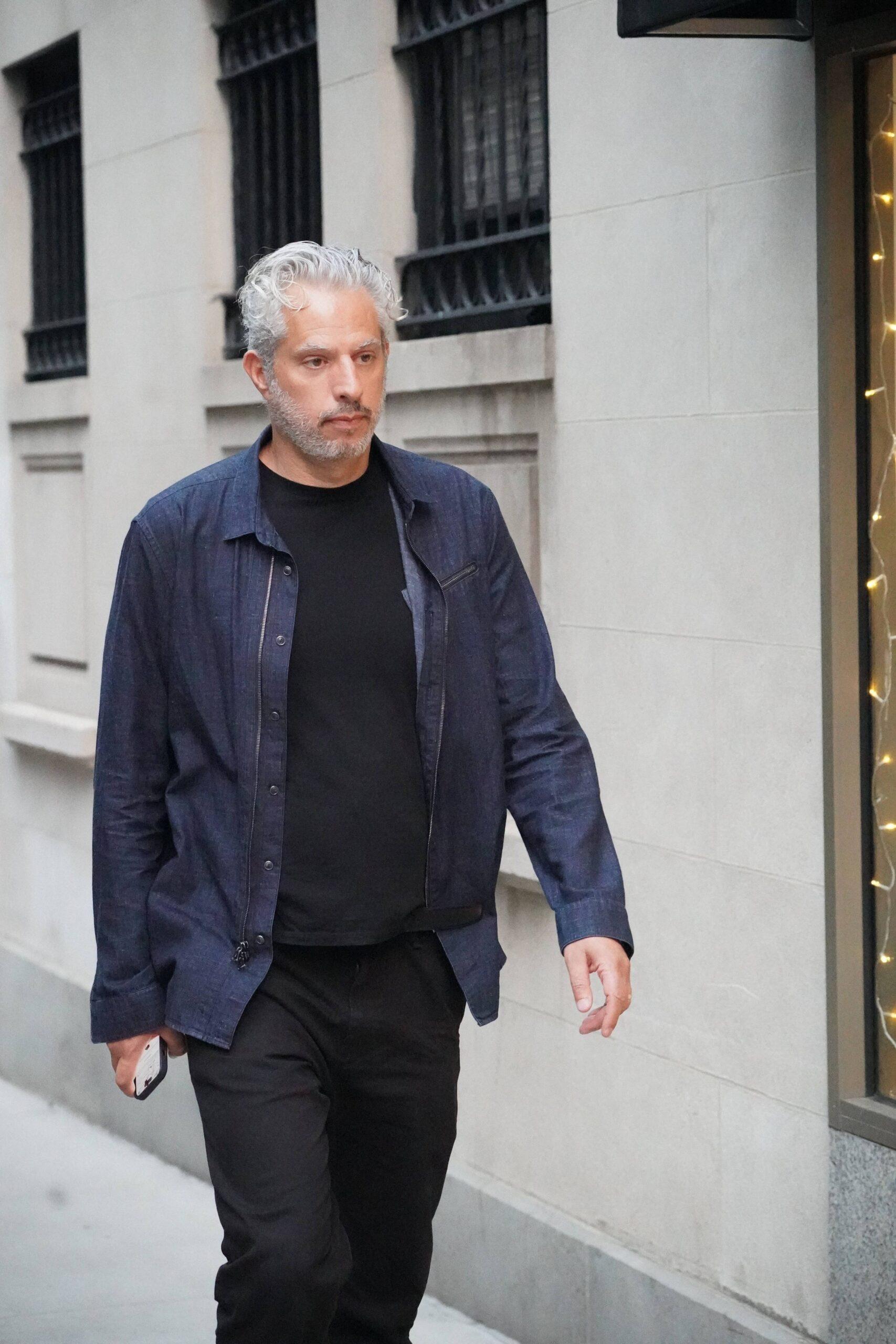 Madonna's manager Guy Oseary leaves her residence in Manhattan after visiting her after her return from the hospital 