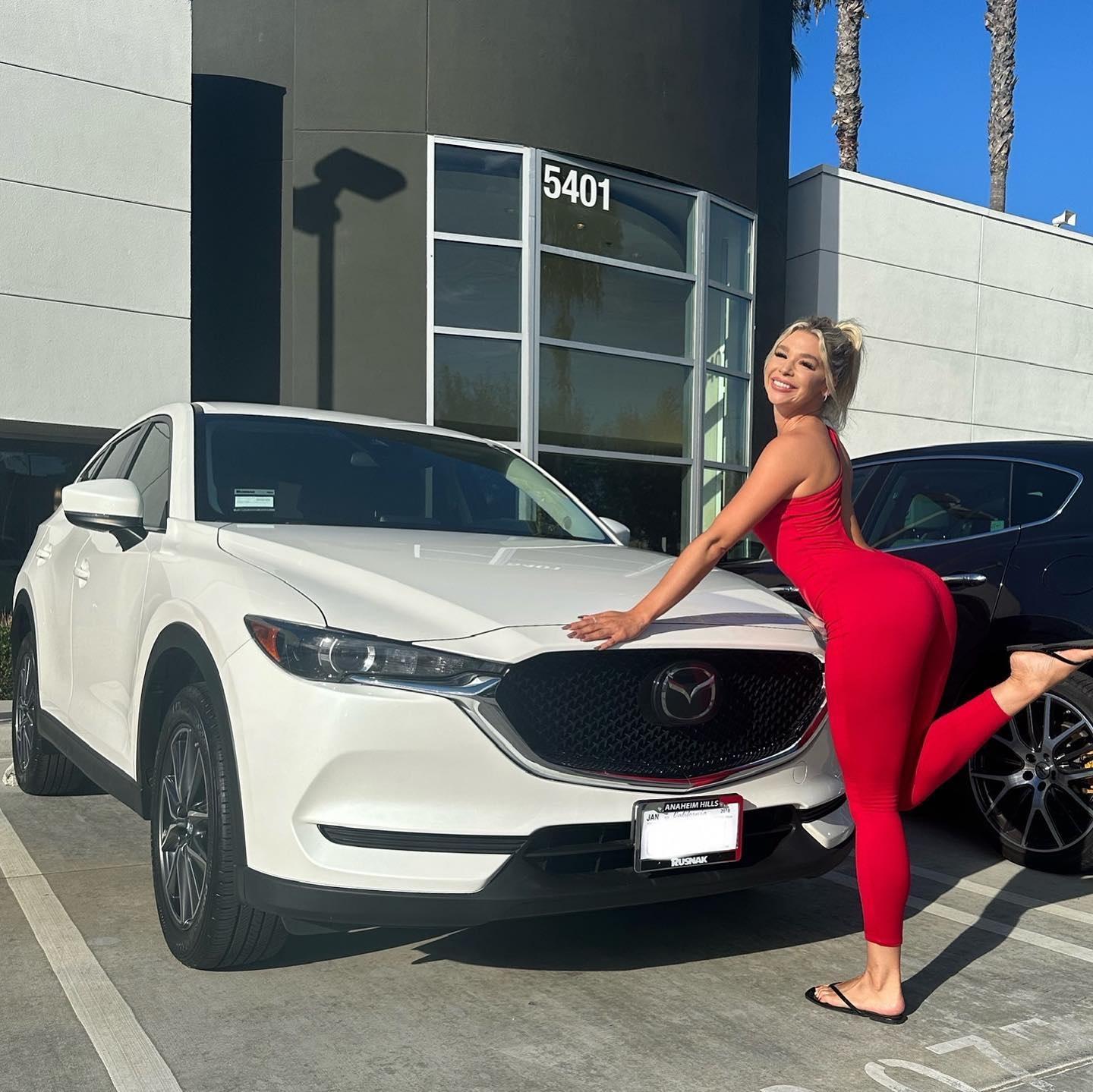 Lindsey Gordon In Curve-Hugging Bodysuit Poses With New Car 2