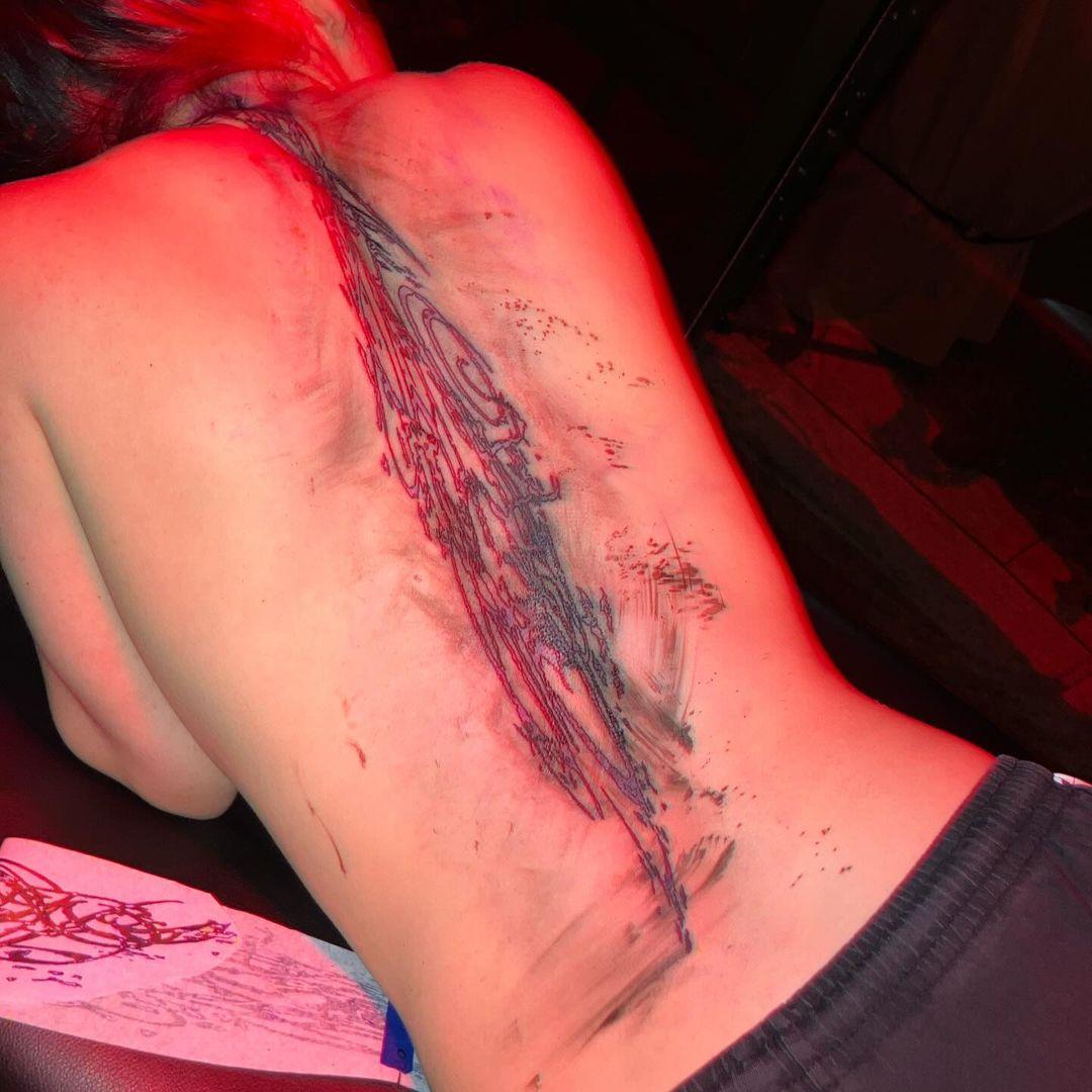 Billie Eilish's Bizzare Back Tattoo Will Make You Do A Double Take, Fans Think It Looks 'Incredible'