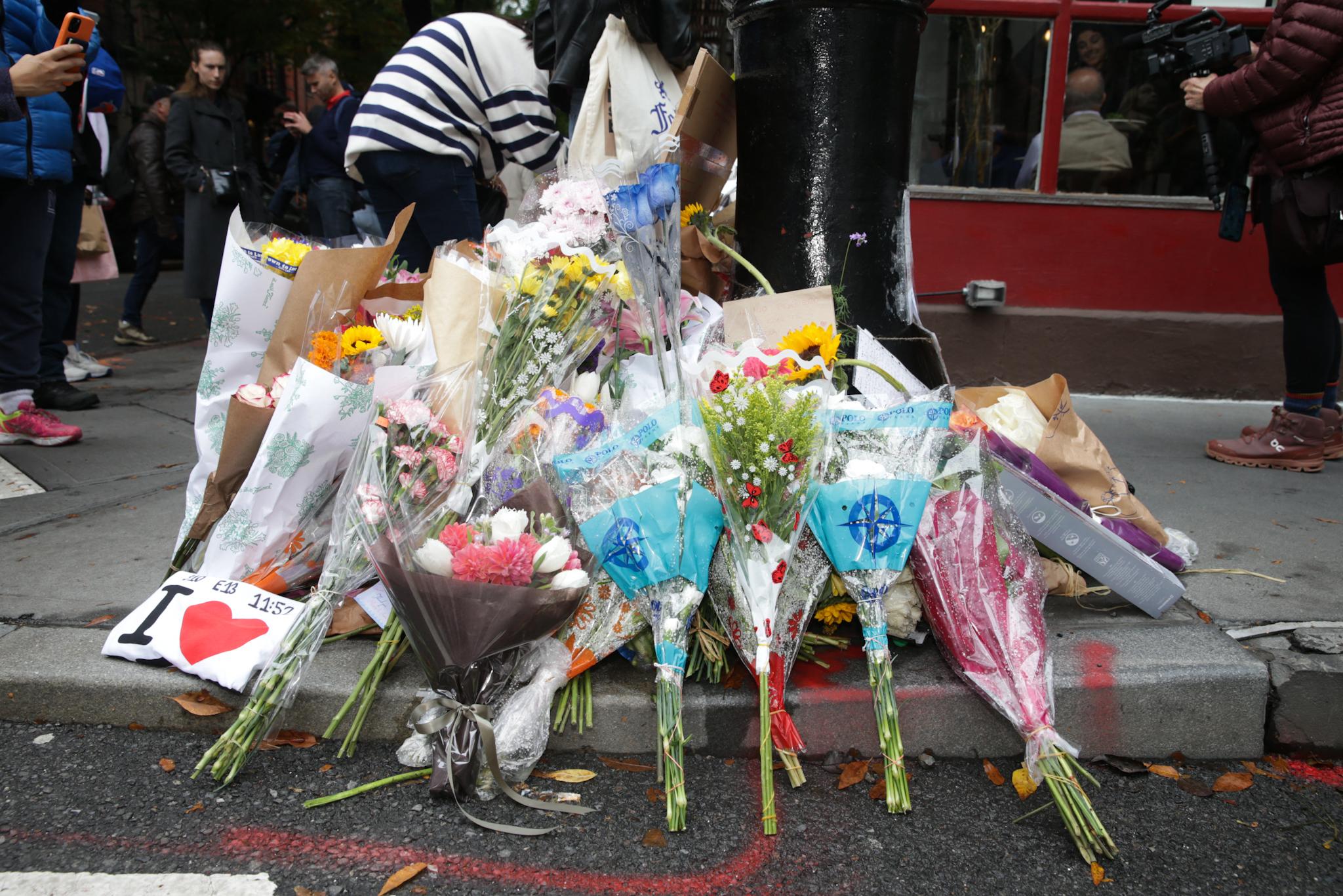 Fans Mourn Matthew Perry Outside 'Friends' Building In NYC