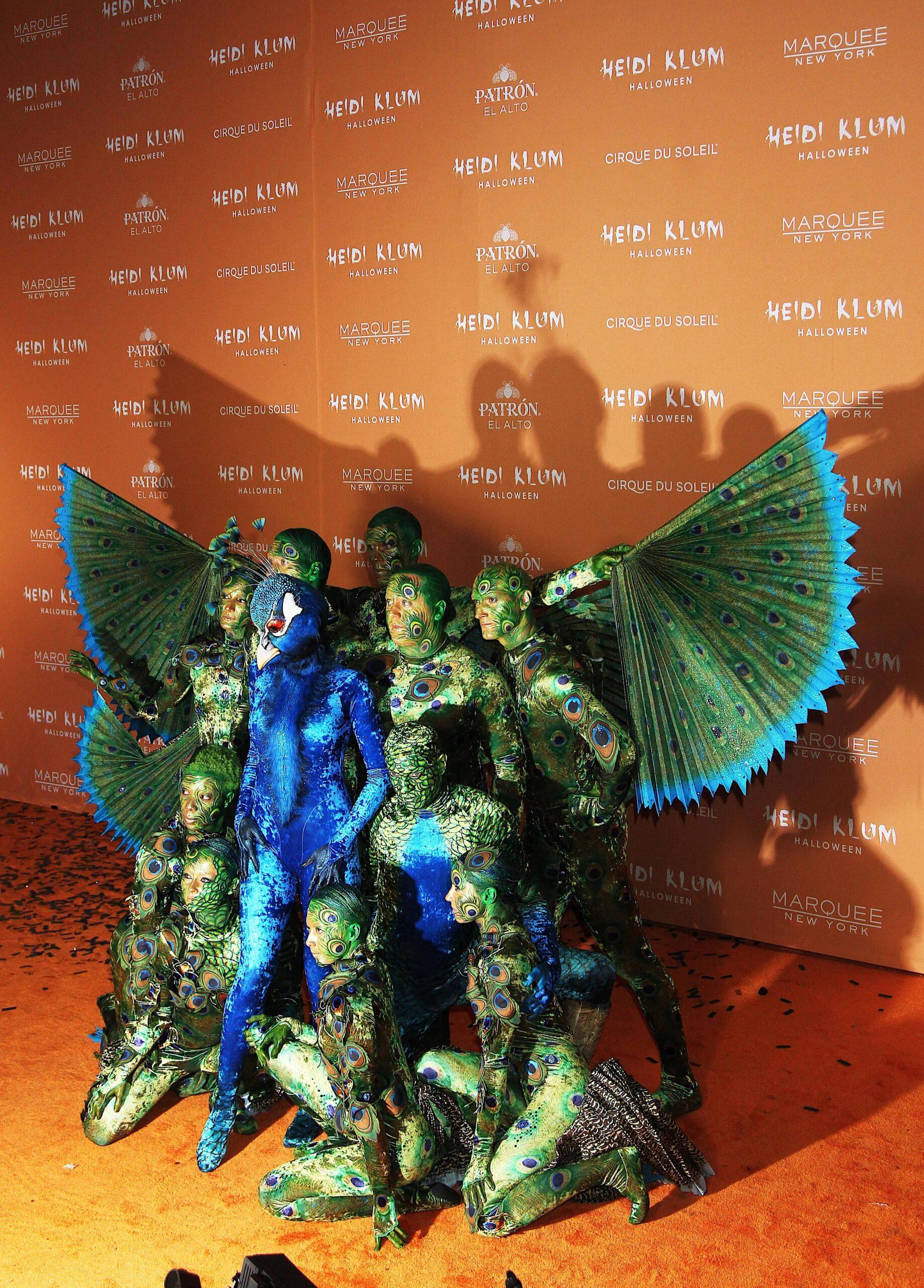 Heidi Klum spreads her wings! Queen of Halloween dresses up as a PEACOCK