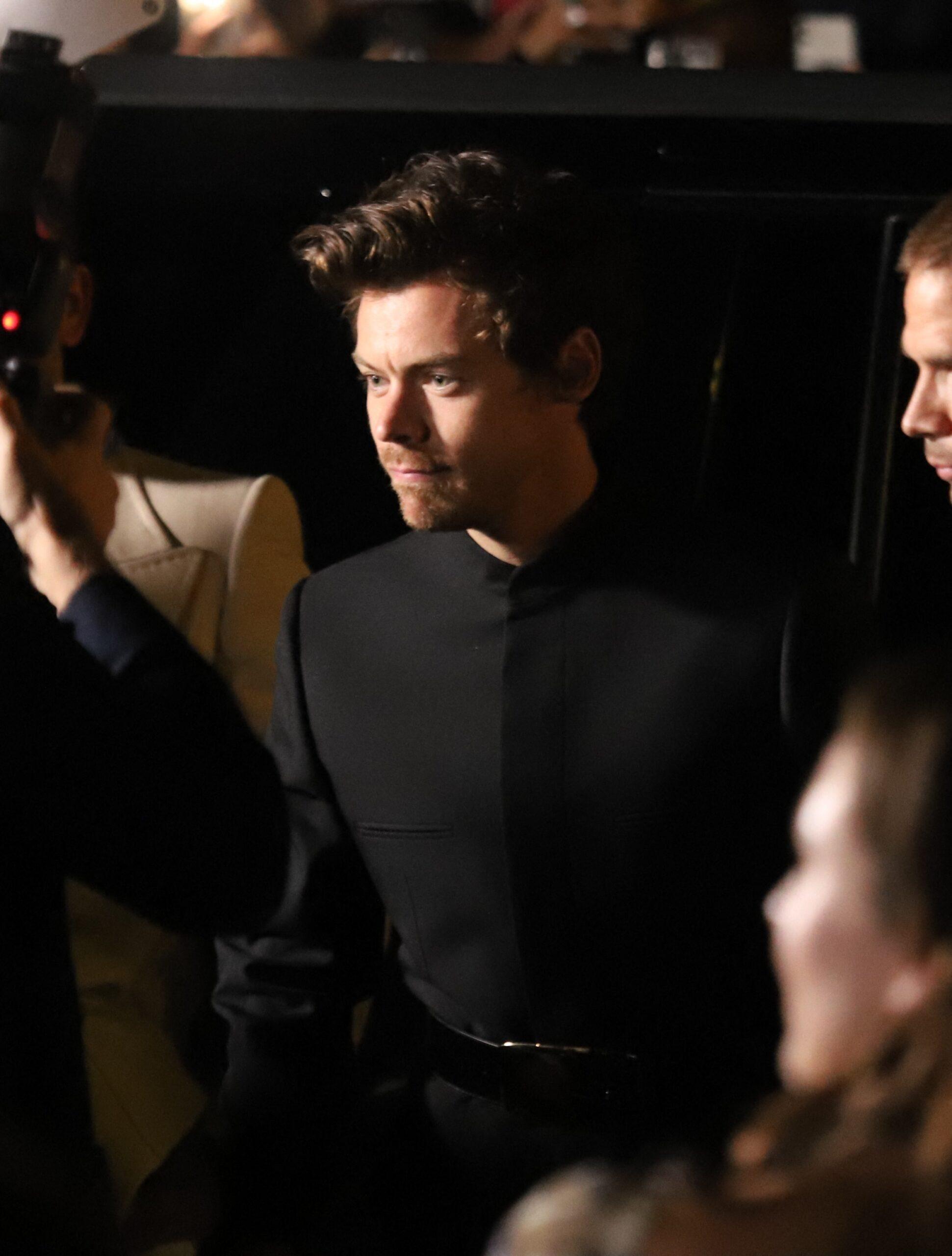 Harry Styles makes a incredibly quick red carpet appearance for his "My Policeman" Premiere