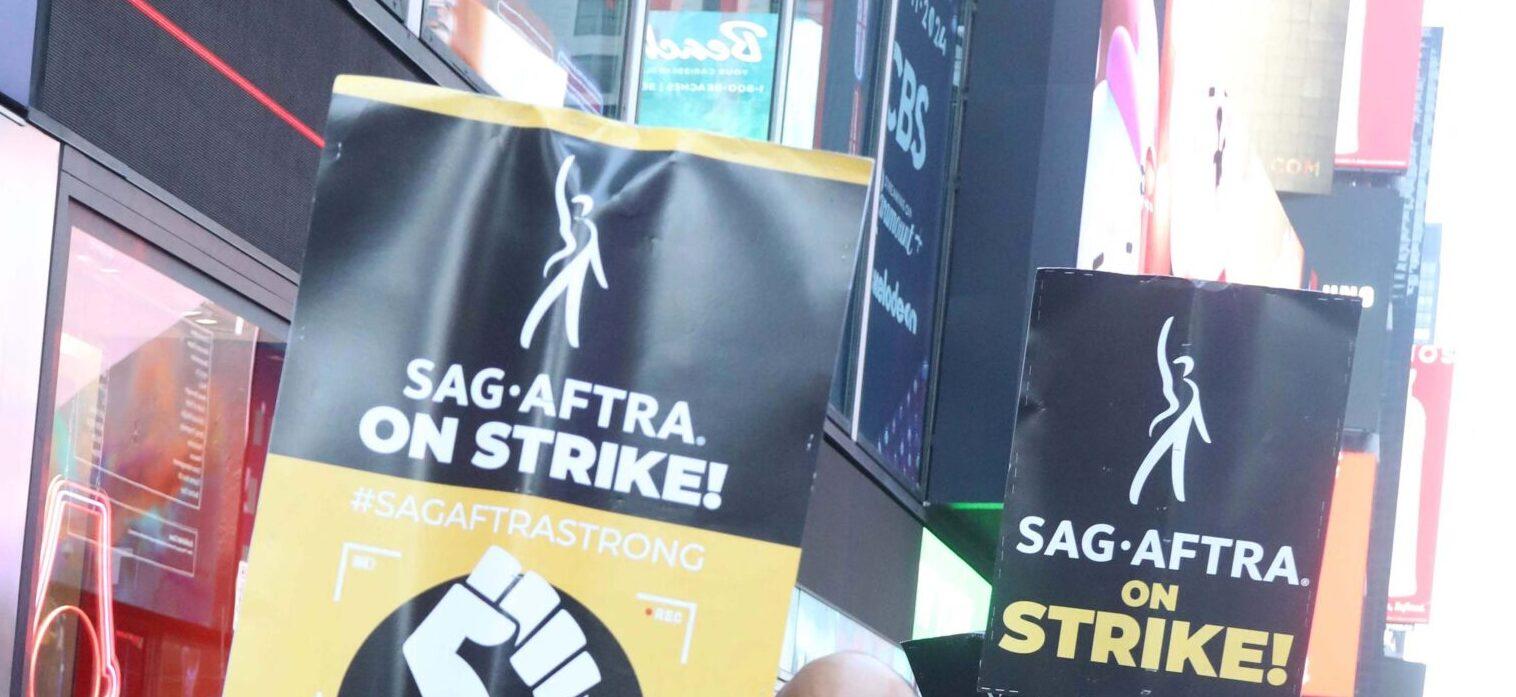 SAG-AFTRA strikers seen outside of the Paramount Building in Times Square