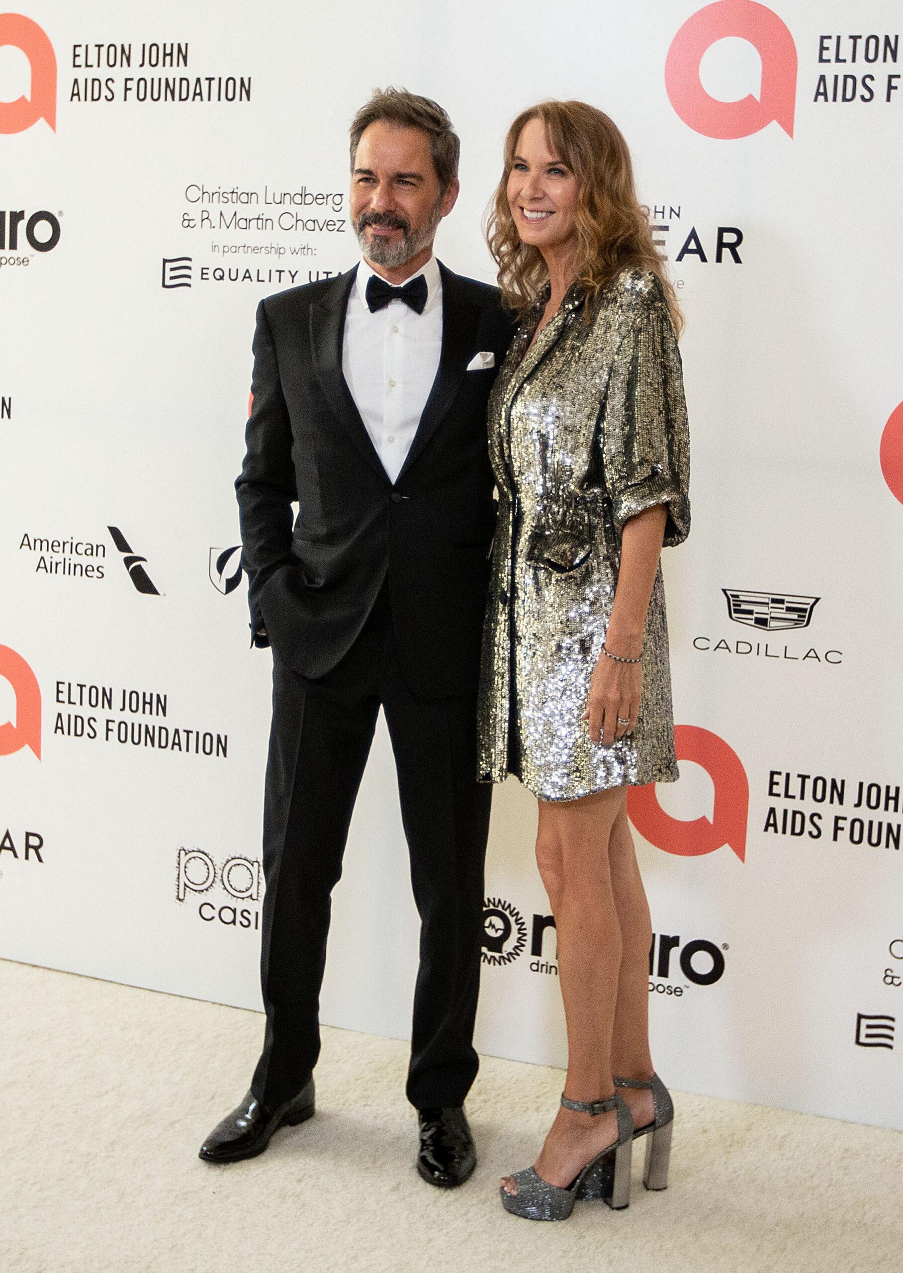 Eric McCormack and Janet Holden at the 30th Annual Elton John AIDS Foundation Academy Viewing Party