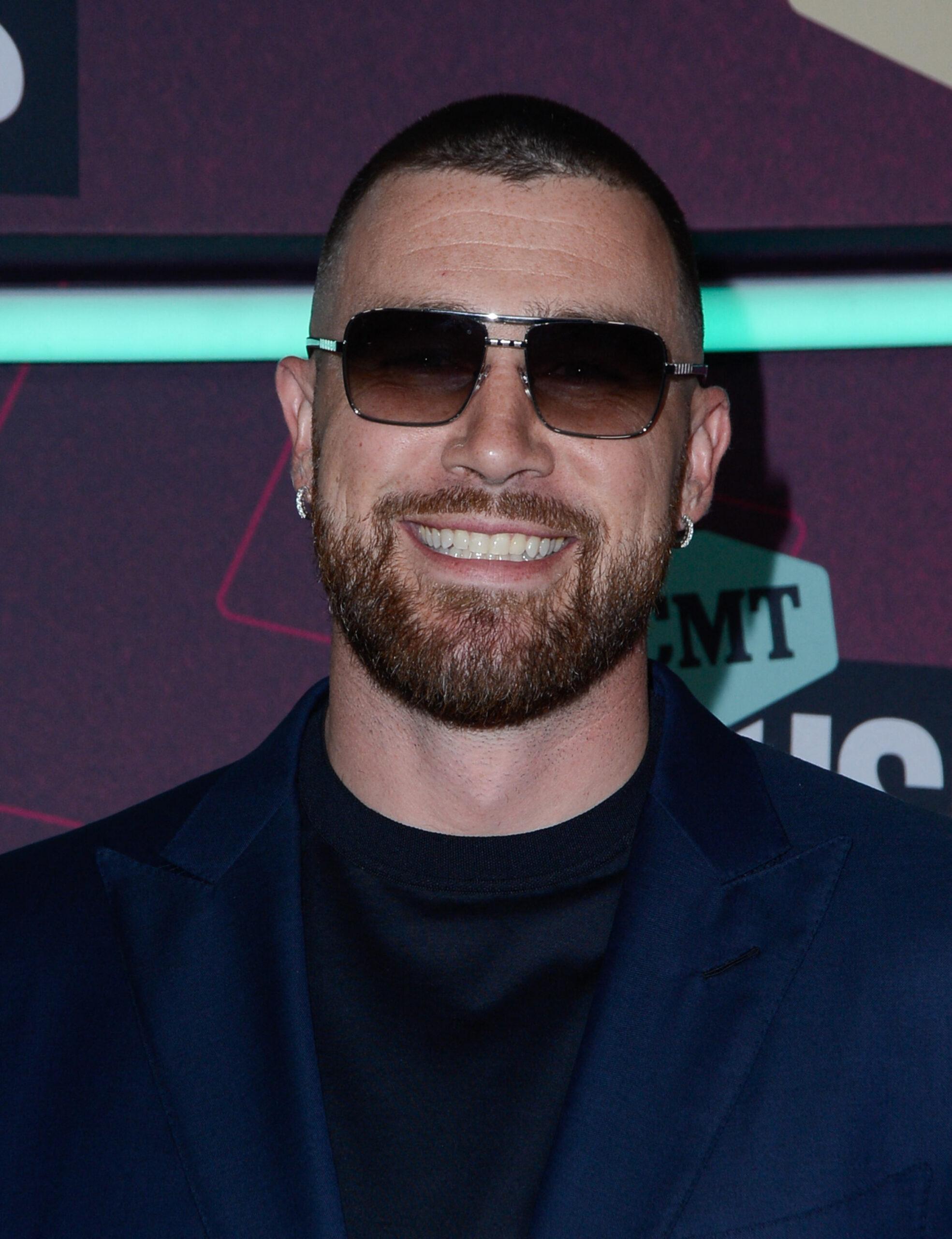 Travis Kelce at the CMT Awards red carpet