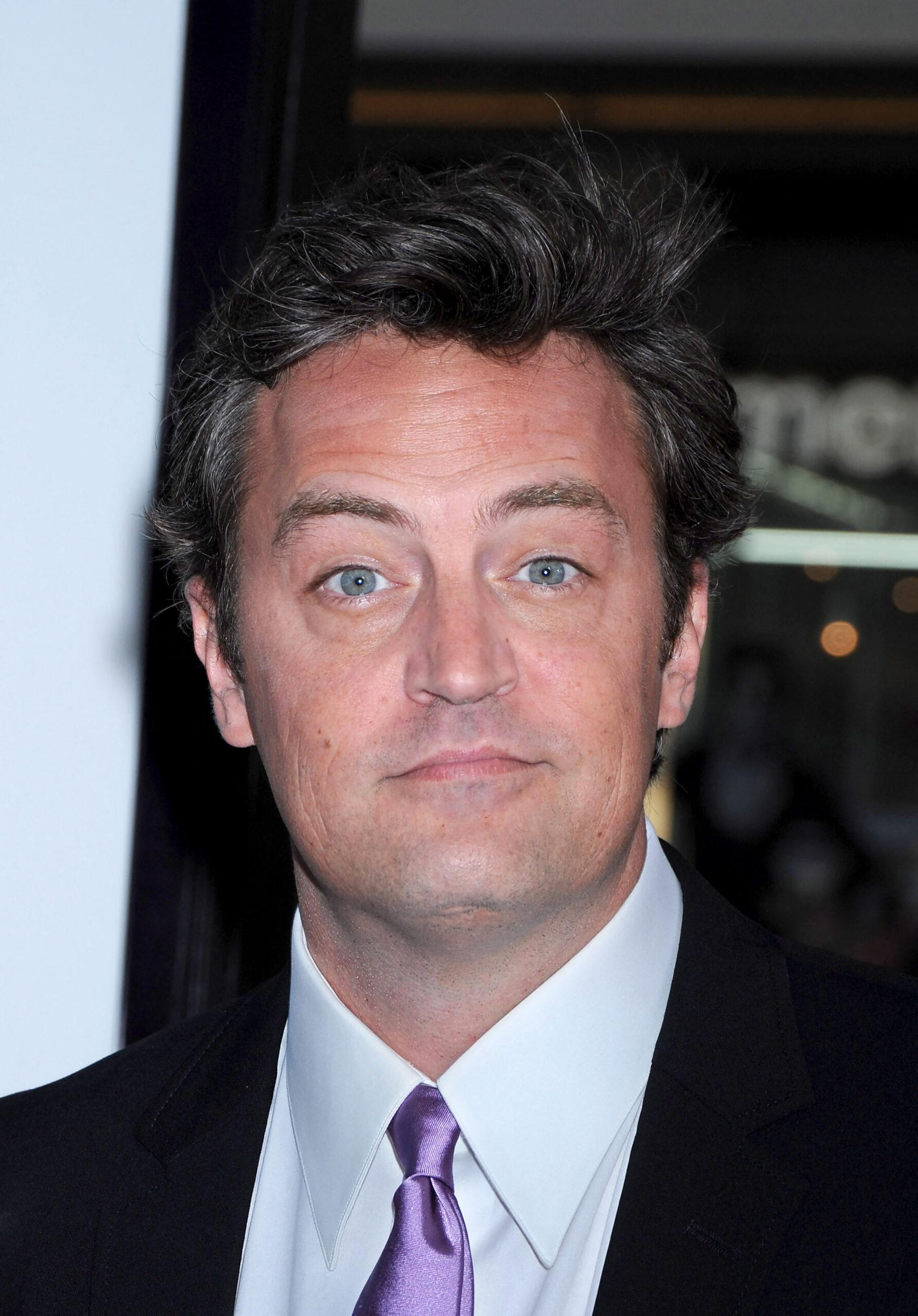 Matthew Perry wide-eyed