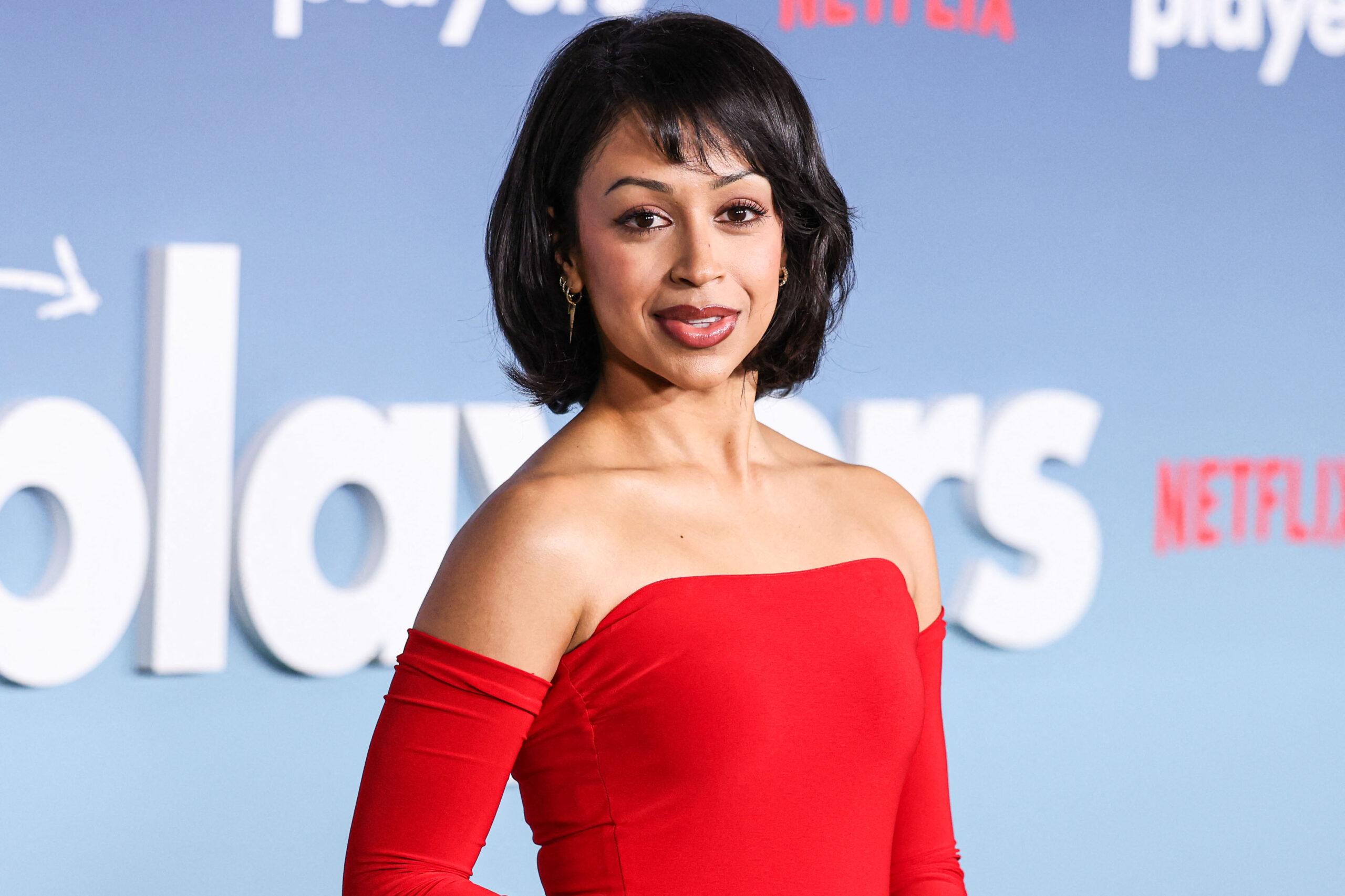 Watch: Liza Koshy Takes A Spill On 2024 Oscars Red Carpet