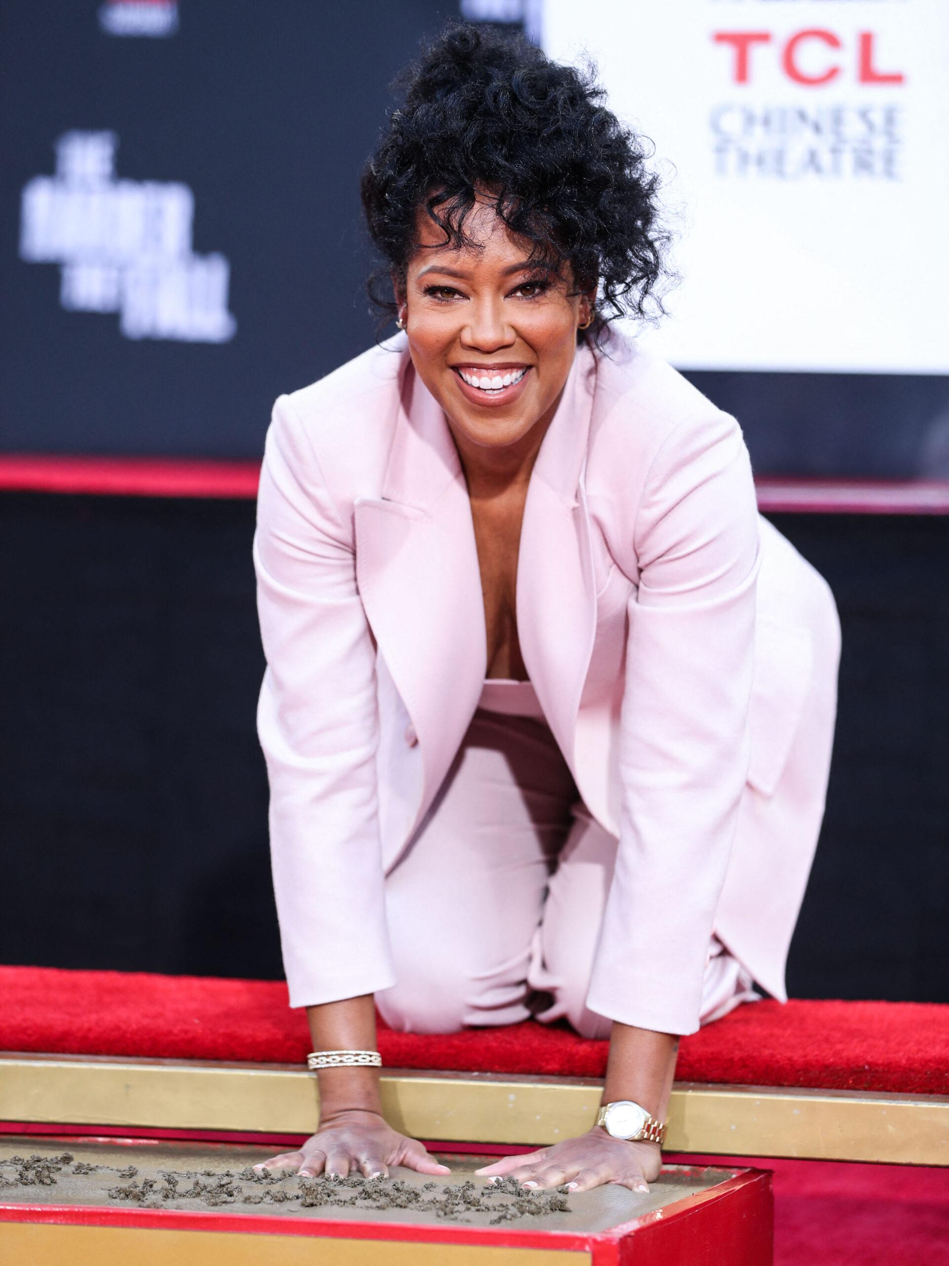 Regina King Handprints And Footprints Ceremony At TCL Chinese Theatre IMAX Forecourt
