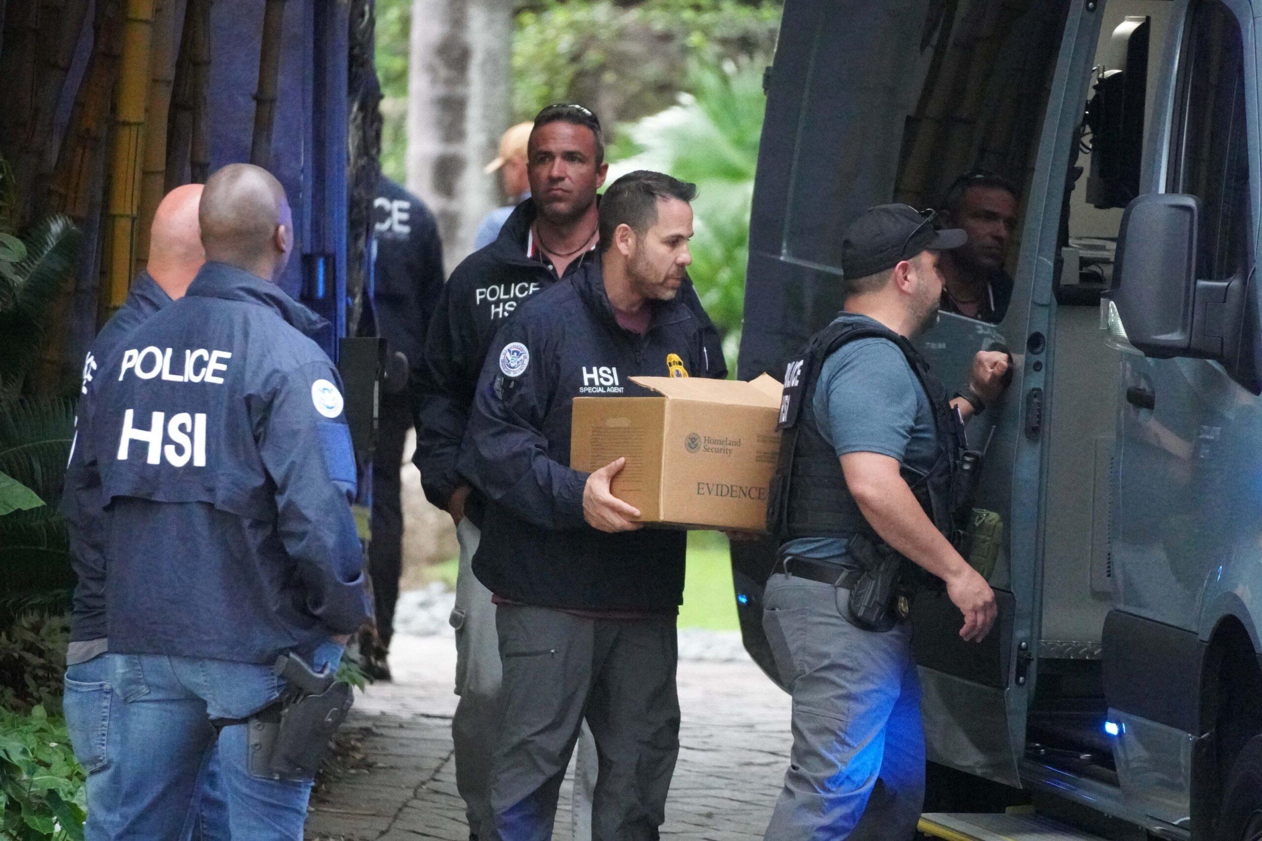 Federal agents are seen removing boxes of evidence from Diddy's Miami mansion