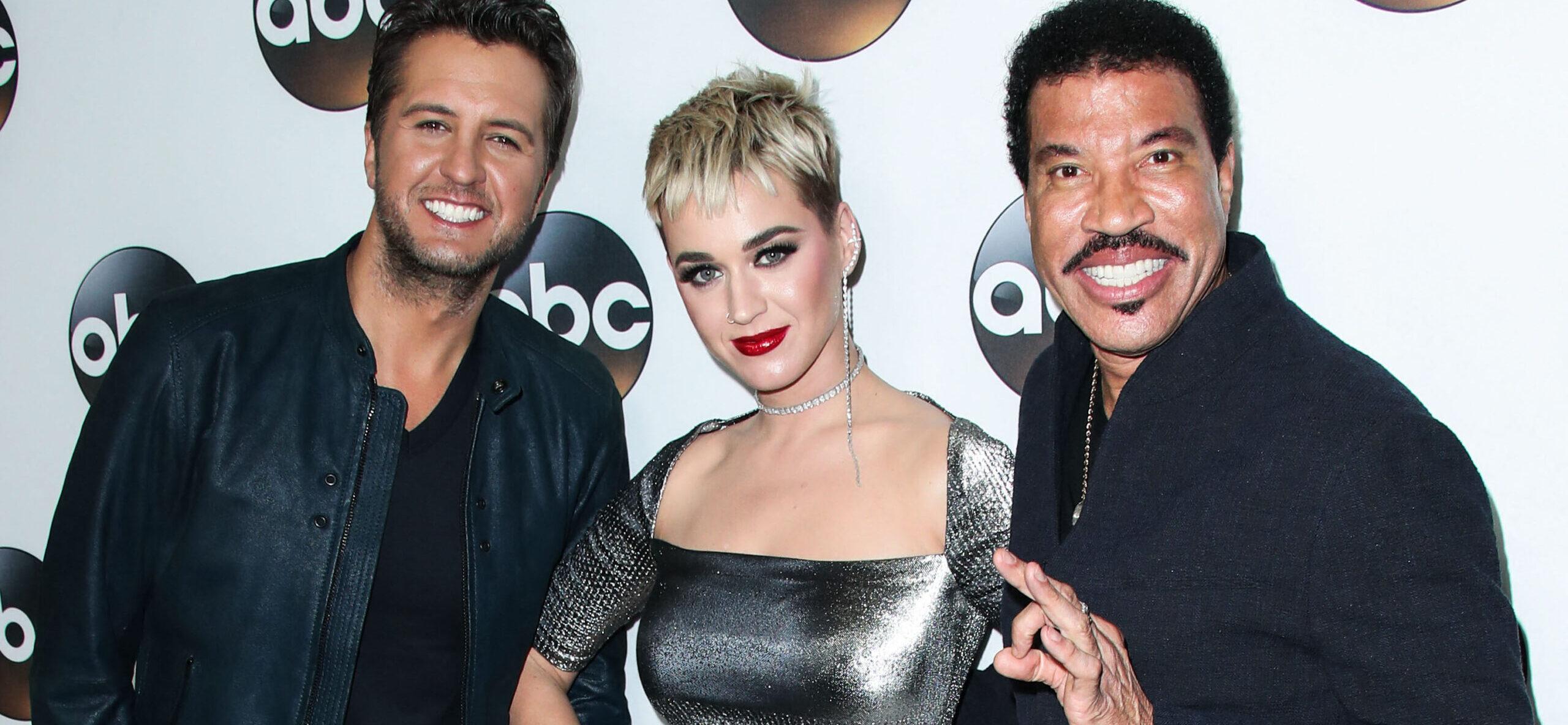 Luke Bryan, Katy Perry, and Lionel Richie pose on red carpet