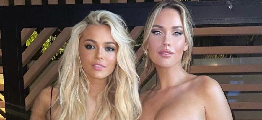 Olivia Dunne and Paige Spiranac pose for the camera.