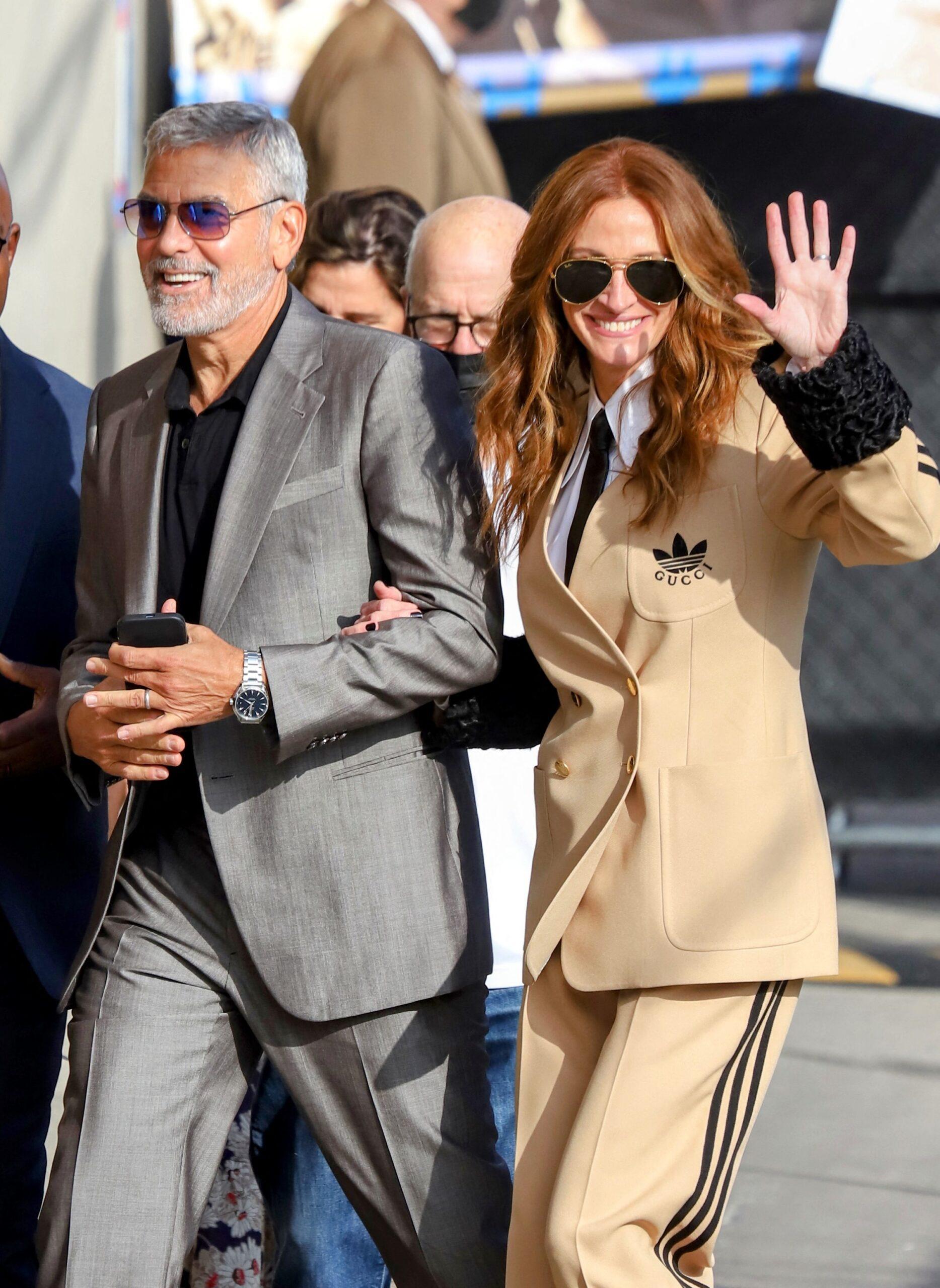 George Clooney and Julia Roberts in Adidas Gucci seen making an appearance arm in arm at Jimmy Kimmel show