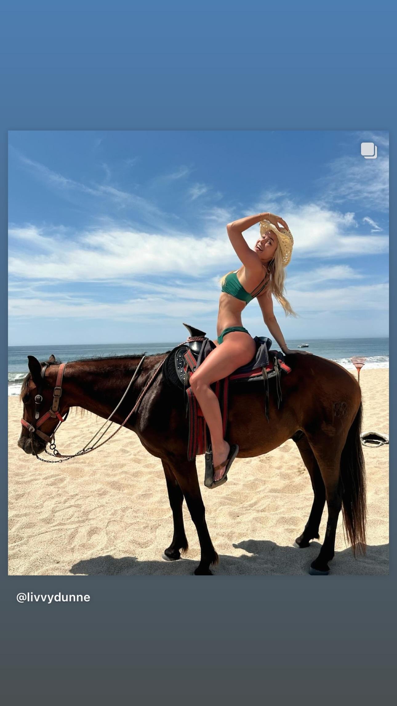 Olivia Dunne rides a horse in her bikini.