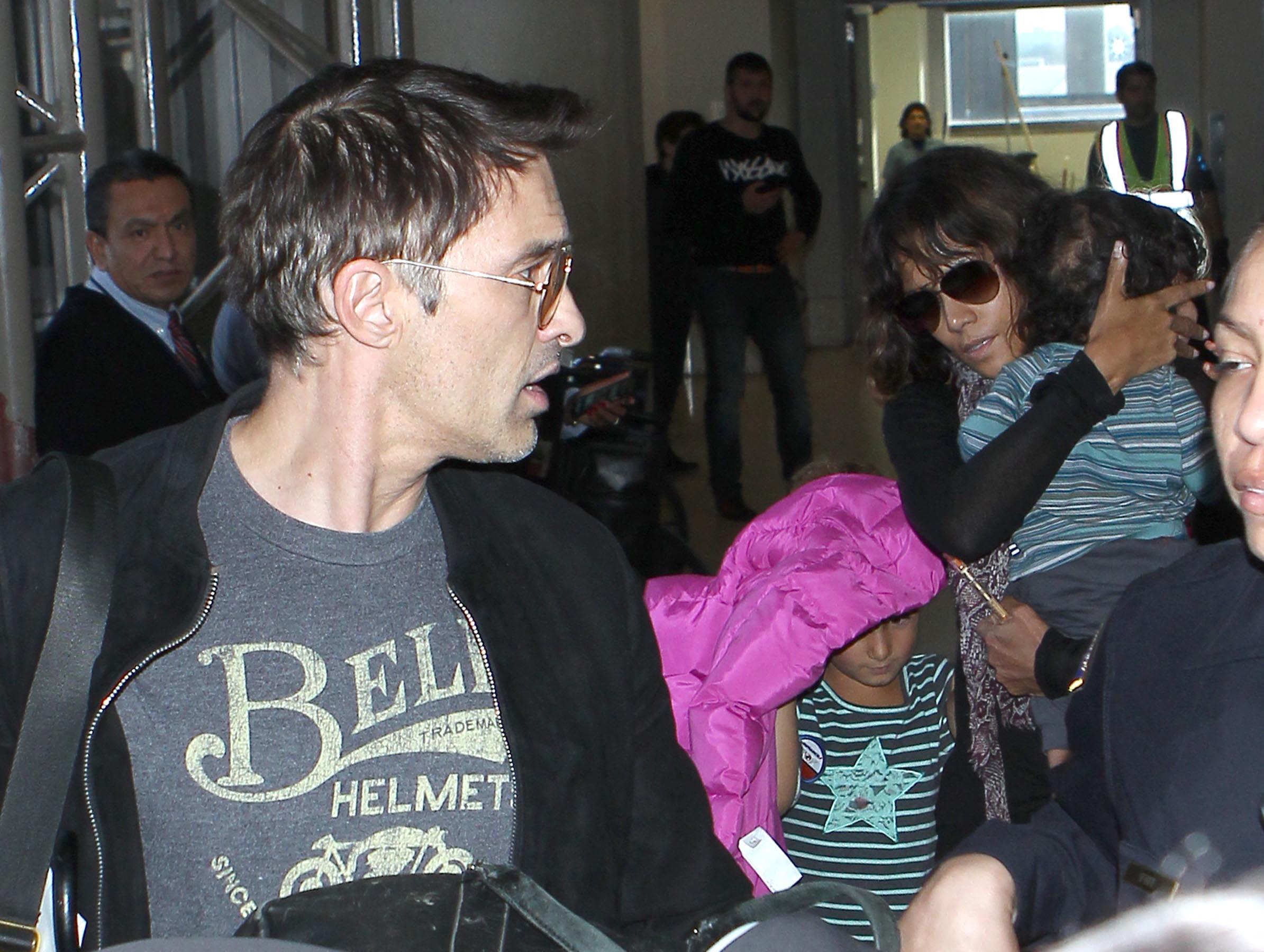 Halle Berry with her kids and Olivier Martinez touch down at LAX