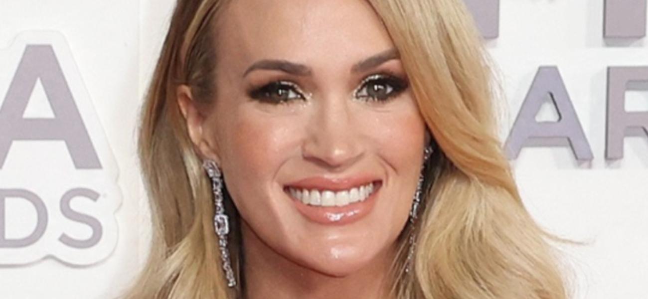 Carrie Underwood smiles at an event