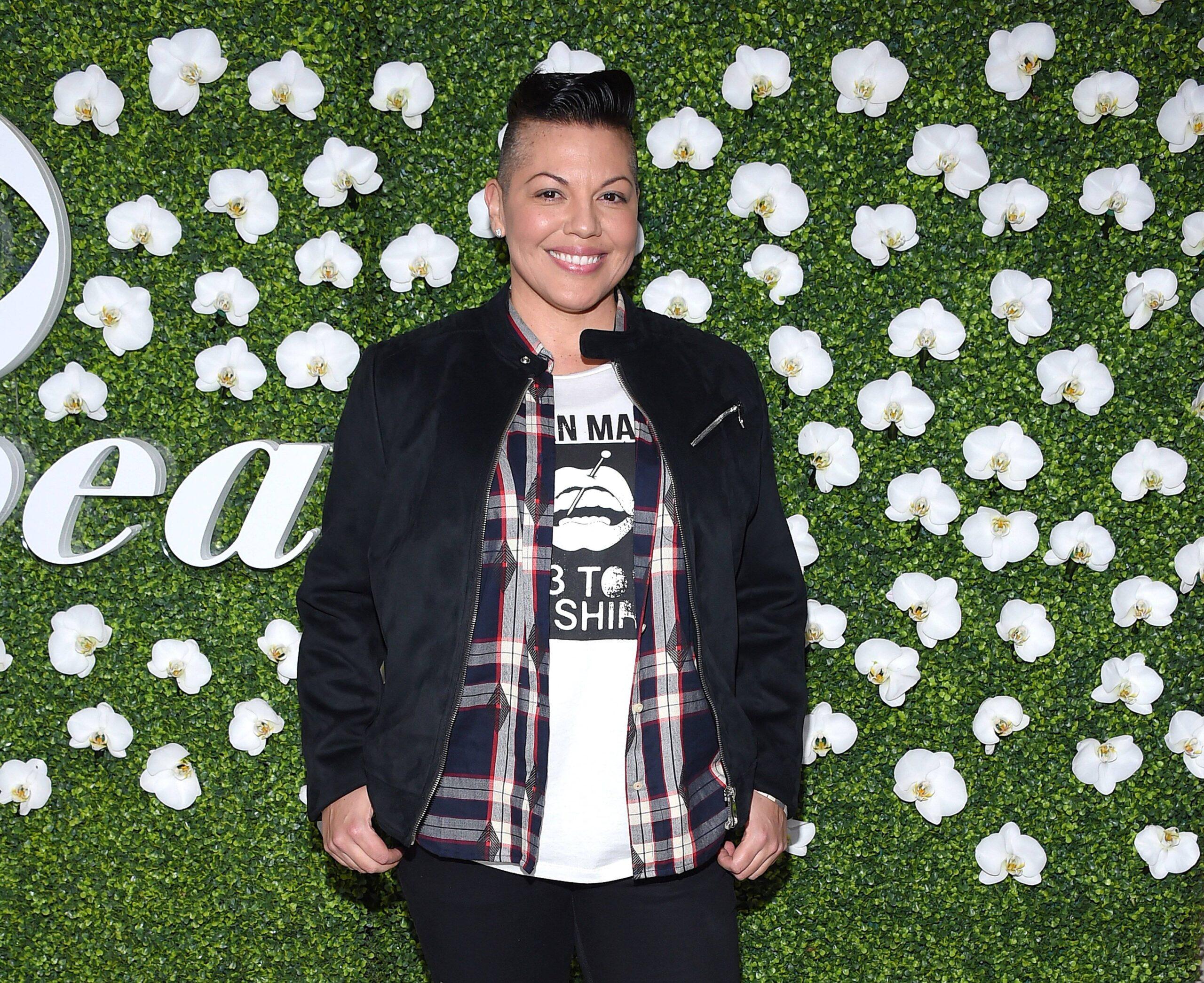 Sara Ramirez poses on the red carpet of The EYEspeak Summit