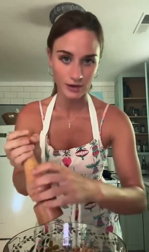 TikToker, Lilly Gaddis, uses racial slur in a cooking video while wearing an apron.