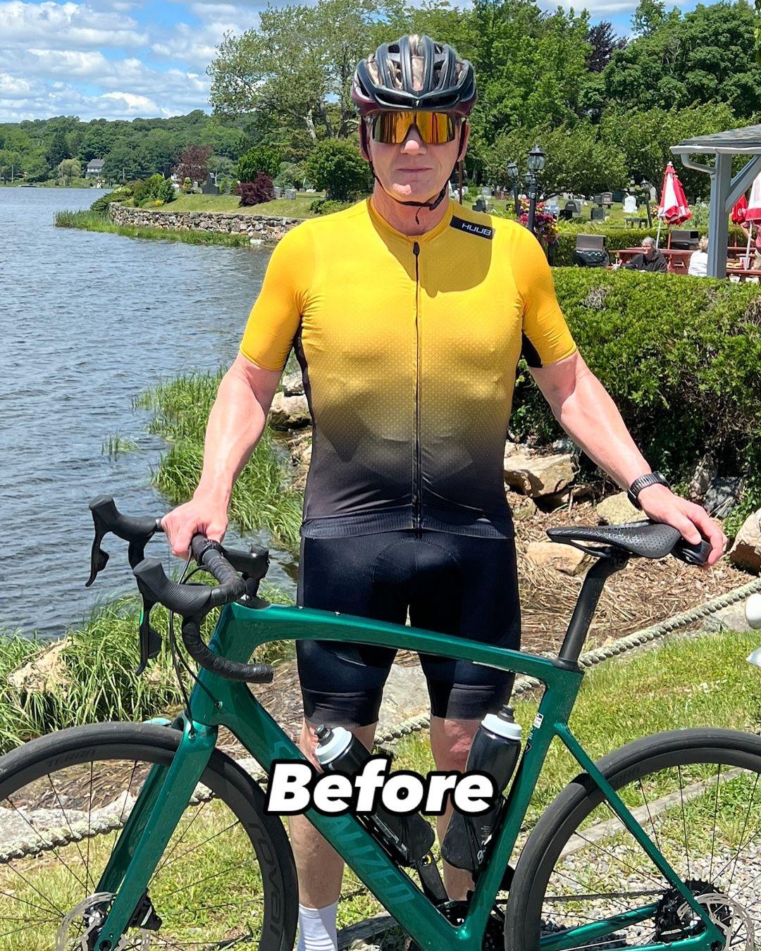 Gordon Ramsay wearing a helmet with his bicycle.
