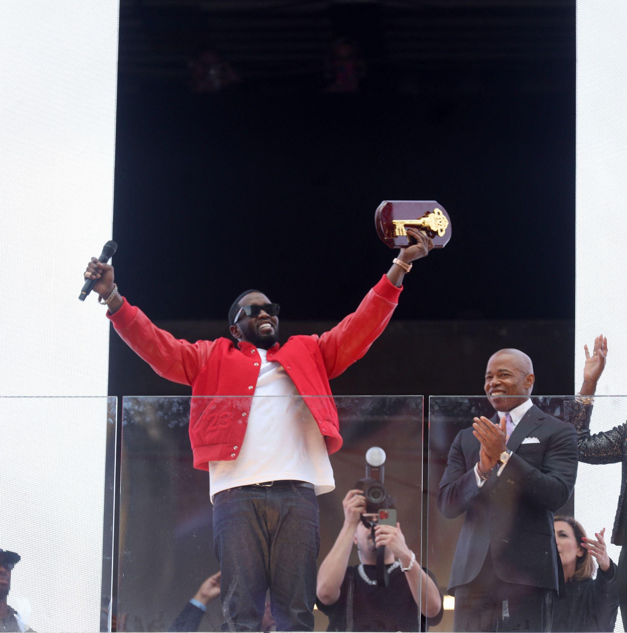 Mayor Eric Adams Awards Key to the City of New York to Sean Diddy Combs at VIP Space out in Times Square in New York.