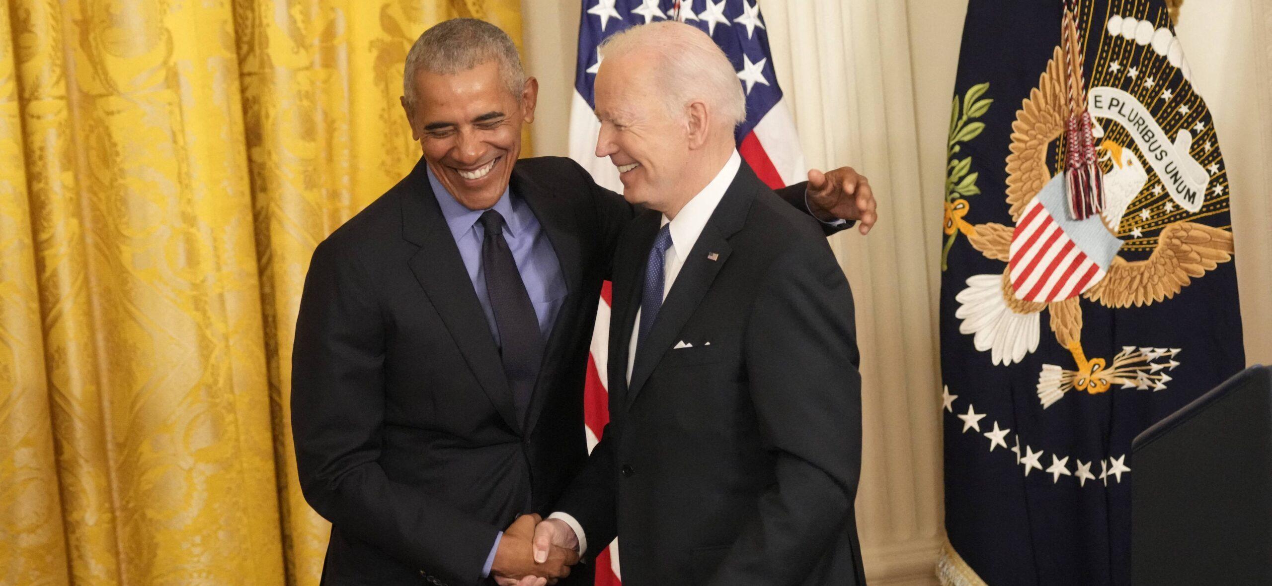 Barack Obama and Joe Biden shaking hands