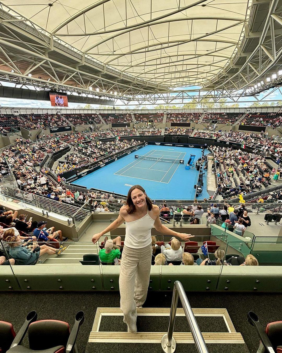 Cate Campbell poses in front of pool