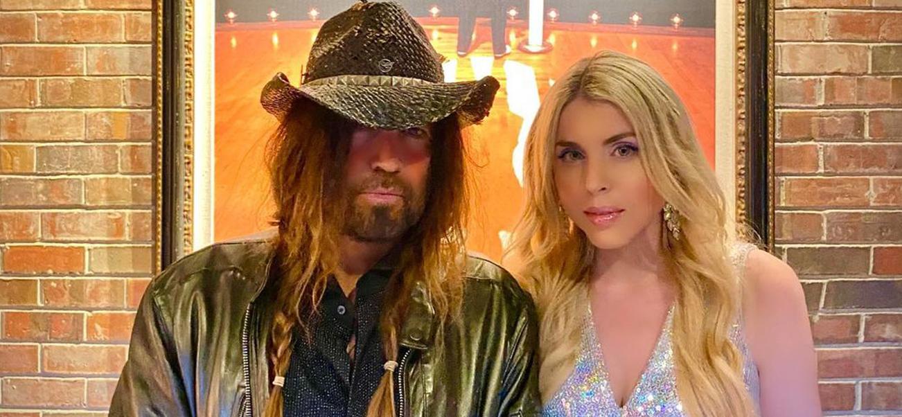 Firerose and Billy Ray Cyrus pose together backstage at the Grand Ole Opry