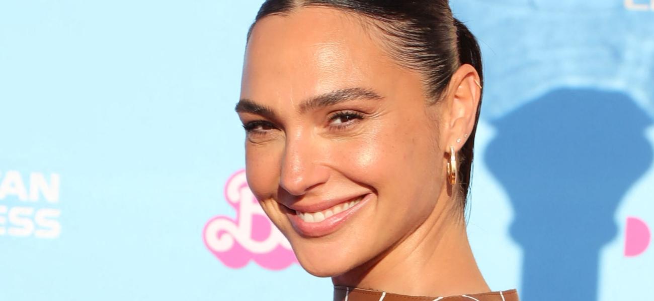 Gal Gadot smiles at a premiere