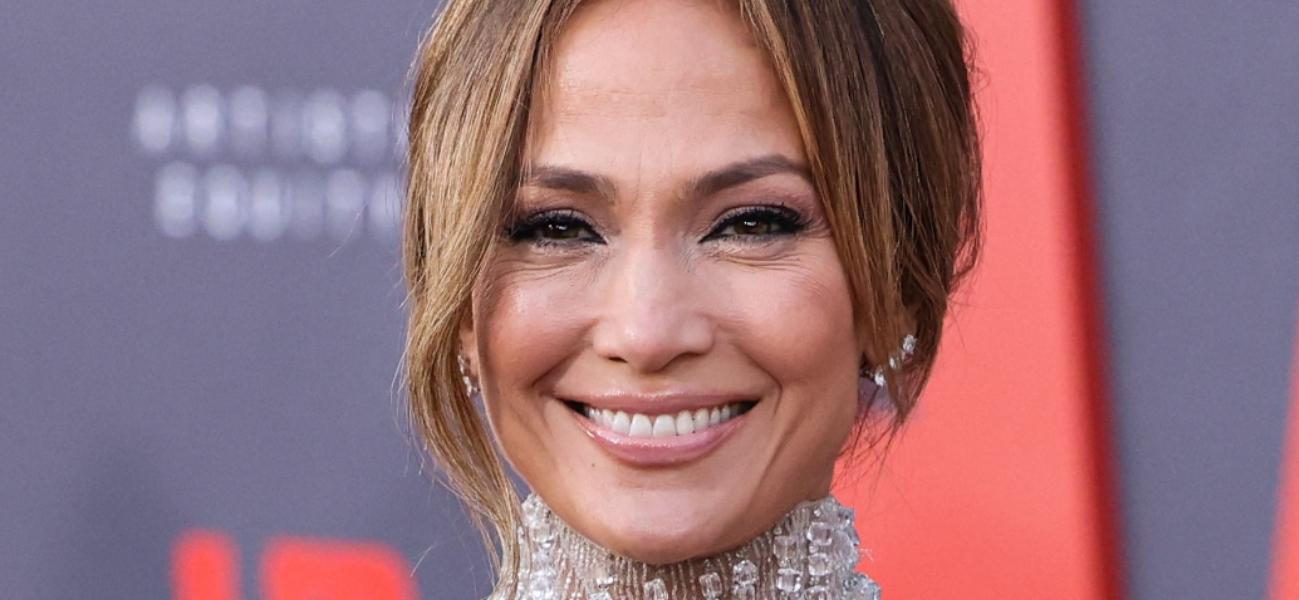 Jennifer Lopez smiling at an event